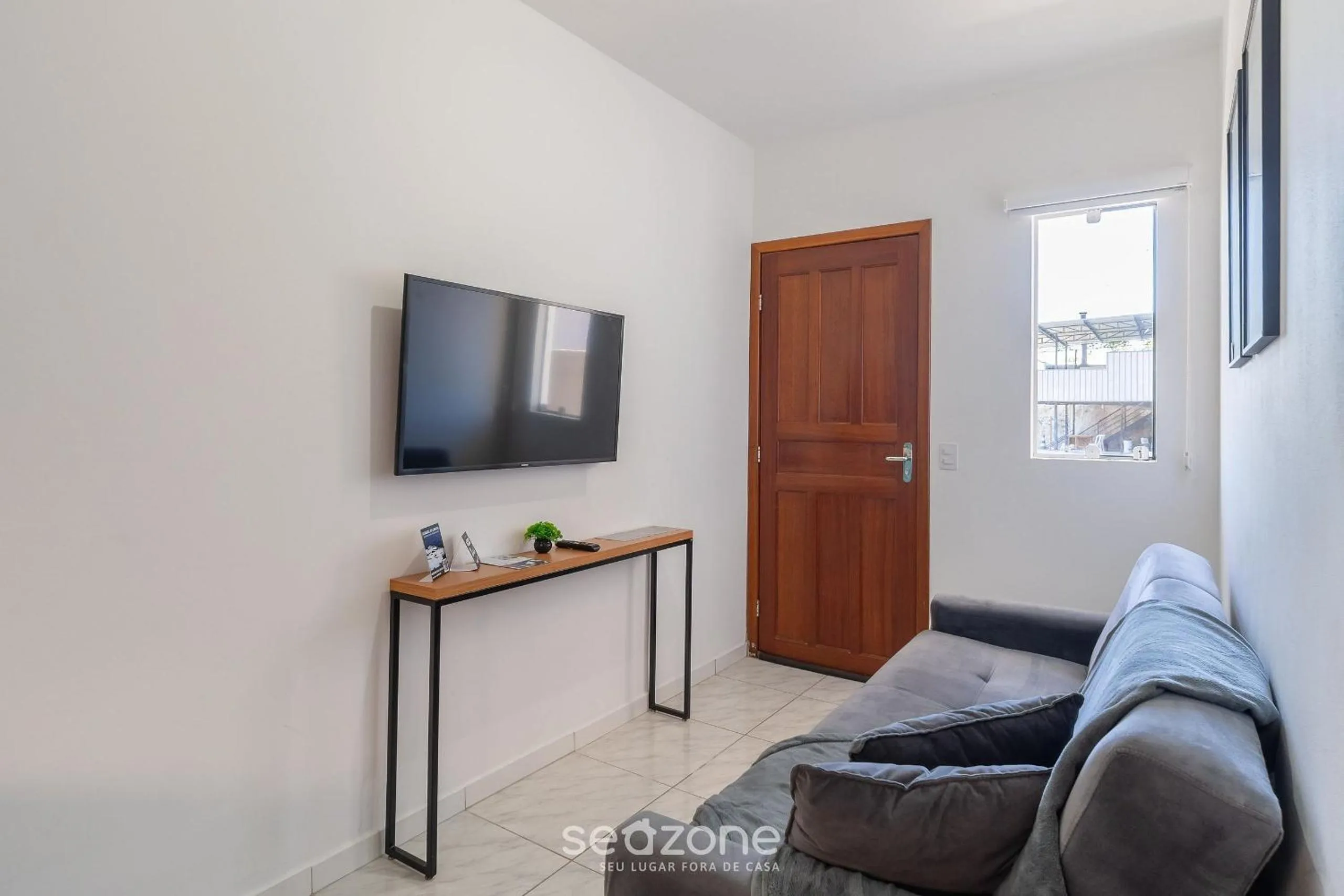 TV and multimedia in Apartamentos em Jurerê - JMA