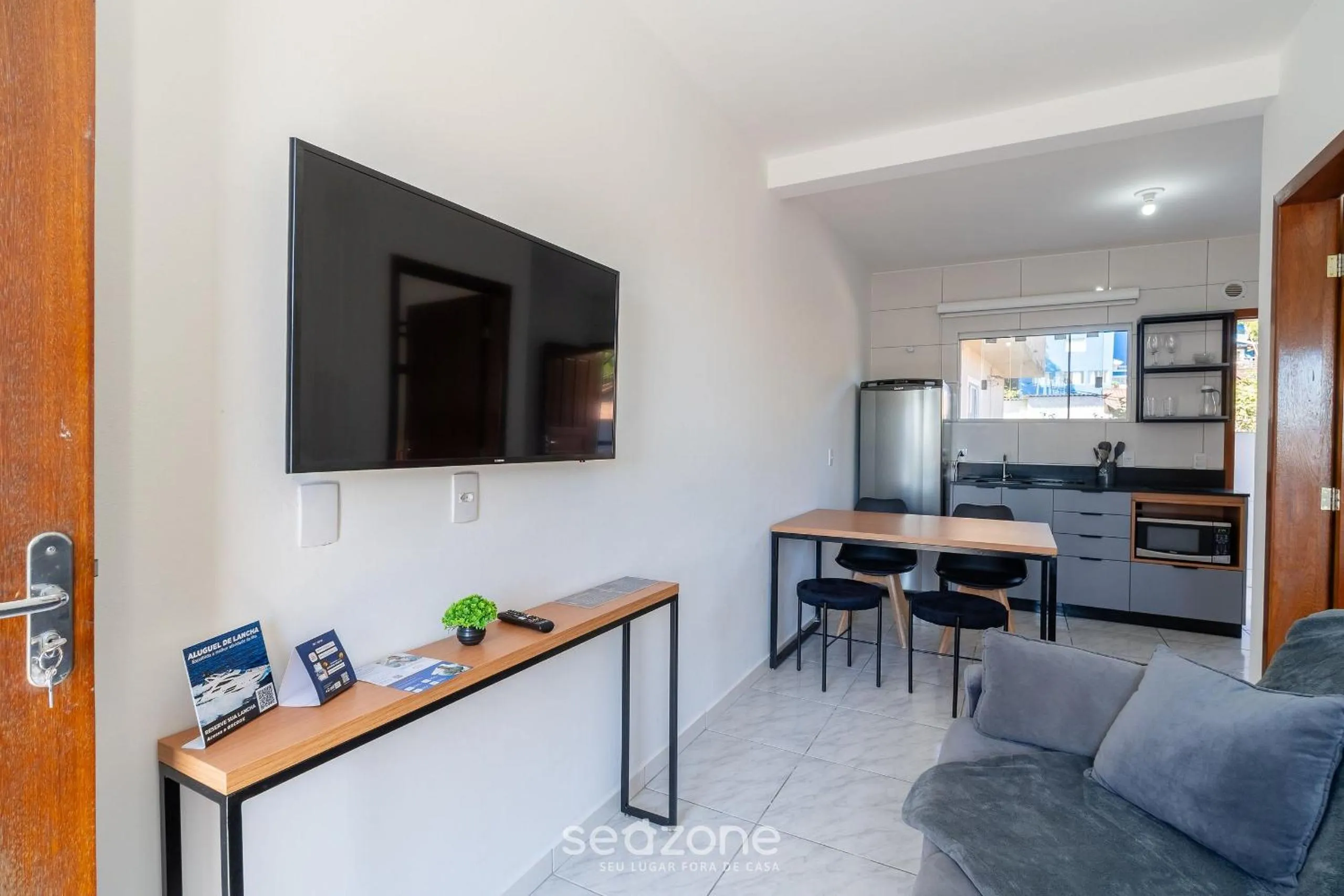 TV and multimedia in Apartamentos em Jurerê - JMA