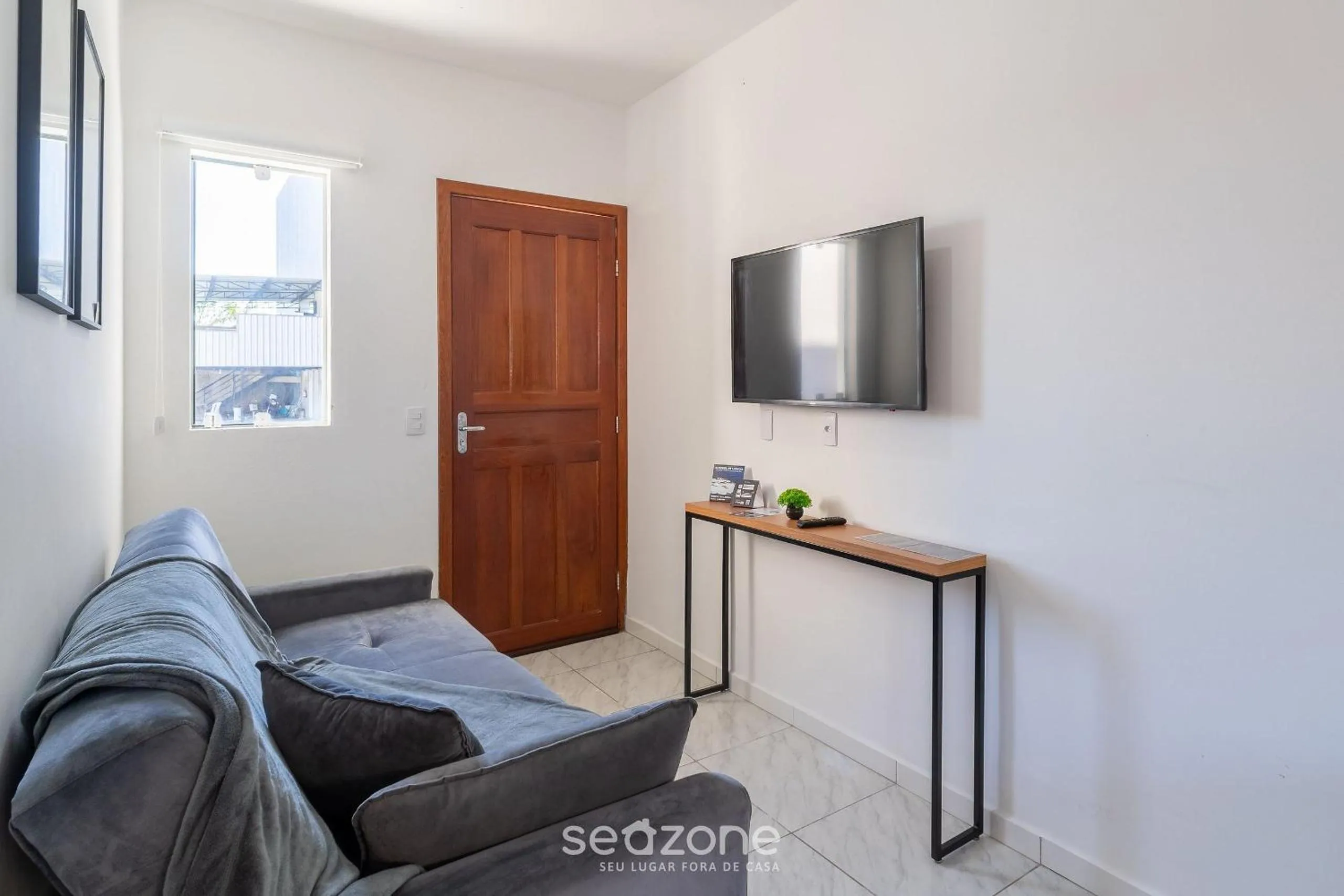 TV and multimedia in Apartamentos em Jurerê - JMA