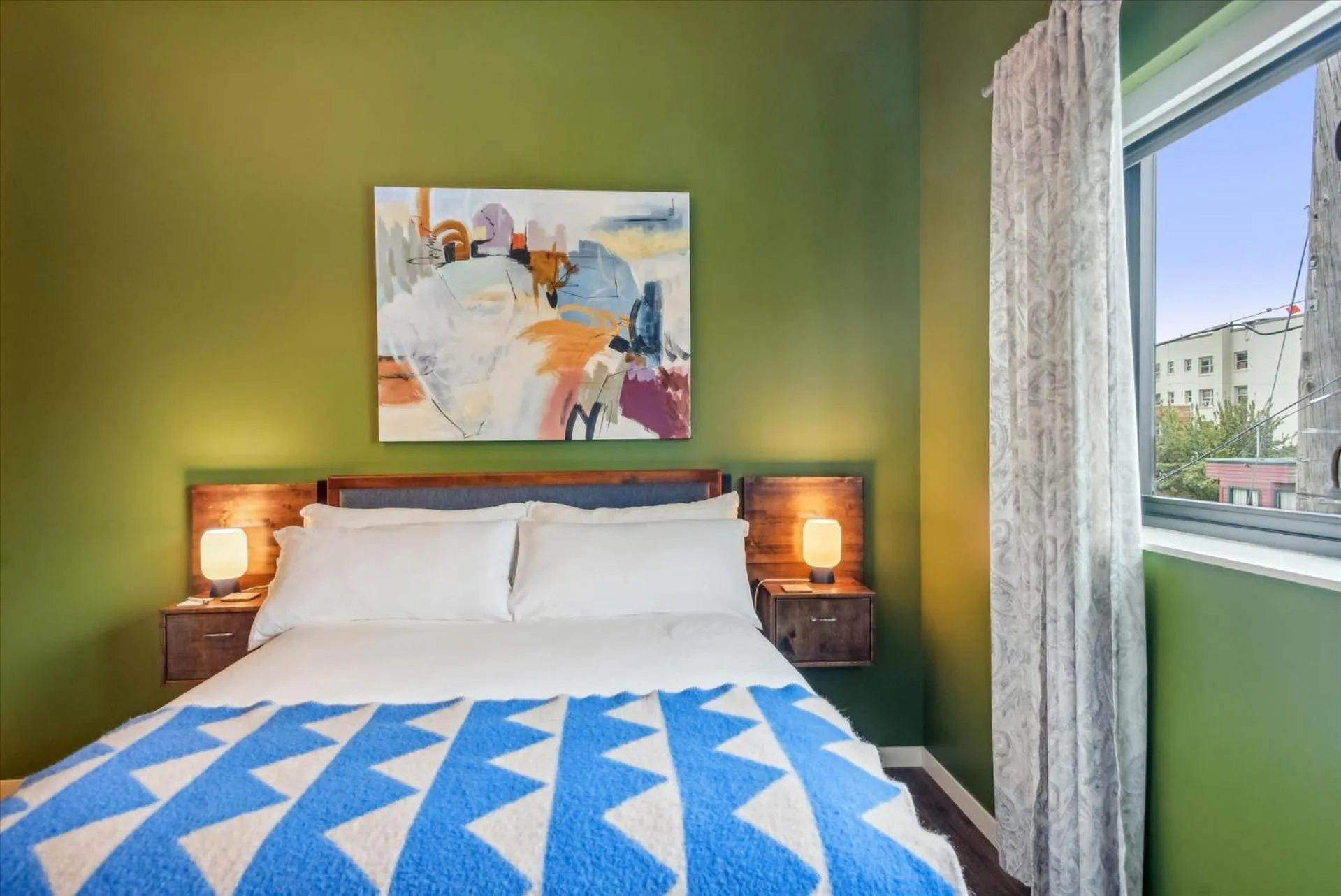 Bed in VioletSuitesPDX Boutique Hotel