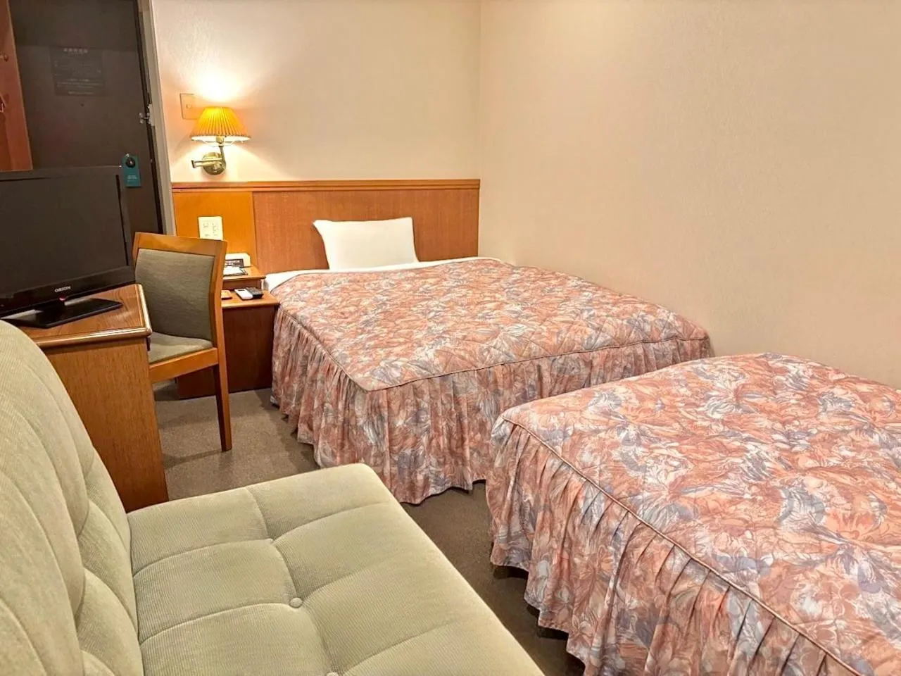 Bed in Matsue Universal Hotel