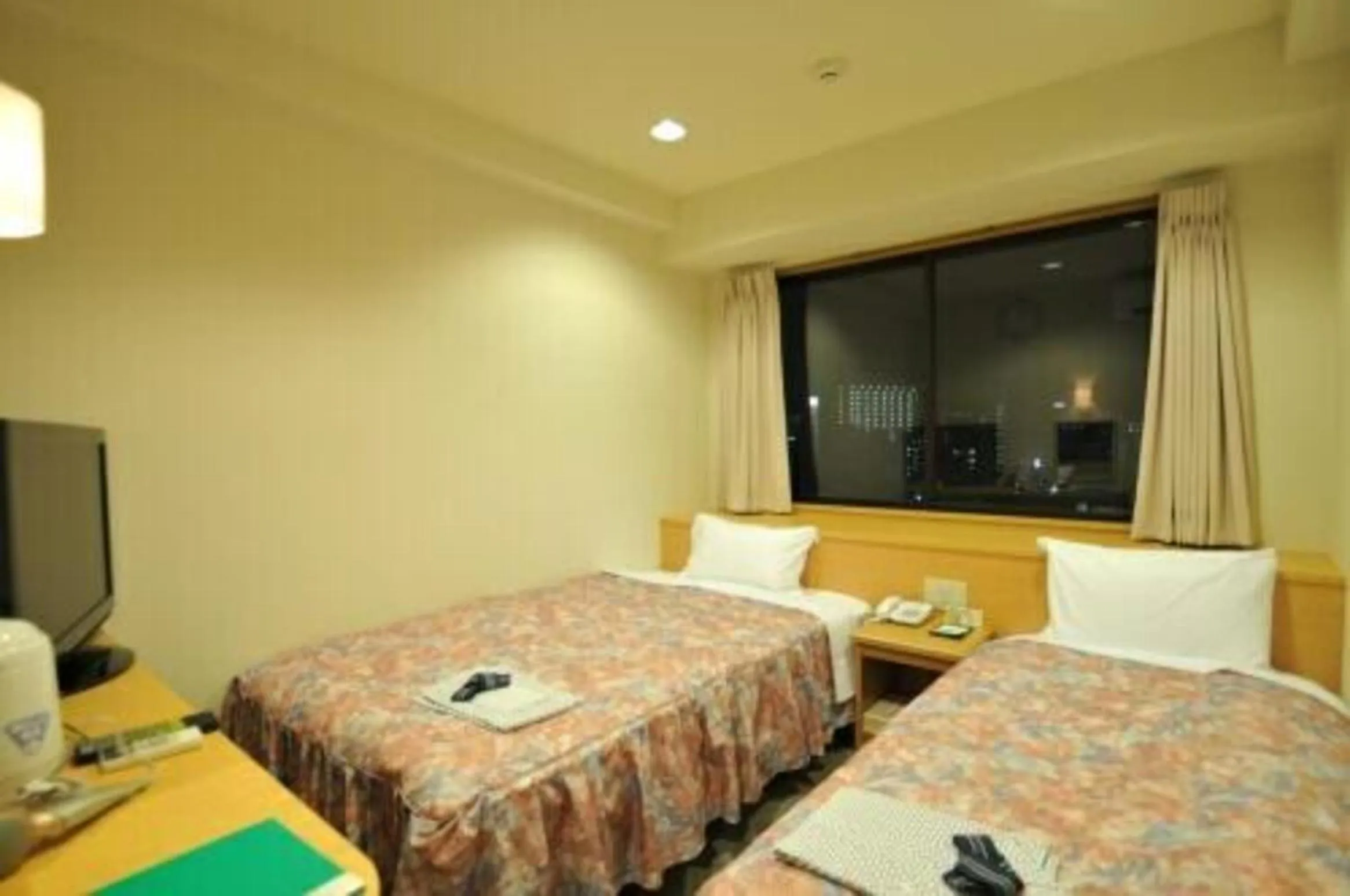 Photo of the whole room, Bed in Hiroshima Ekimae Universal Hotel