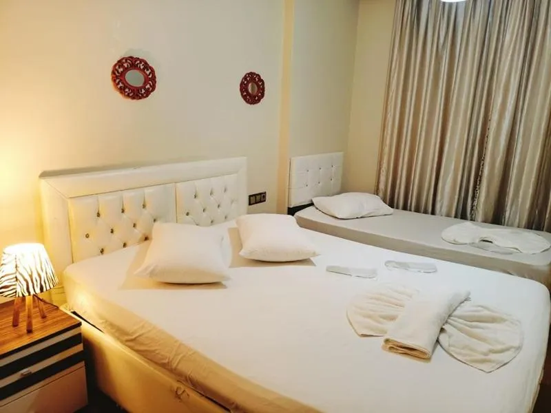 Bed in Doğan Palace Hotel