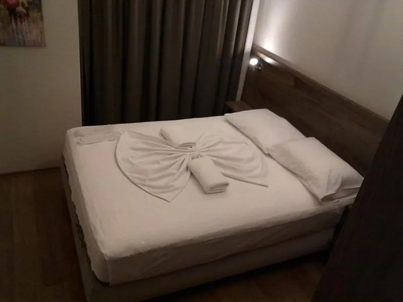 Bed in Doğan Palace Hotel