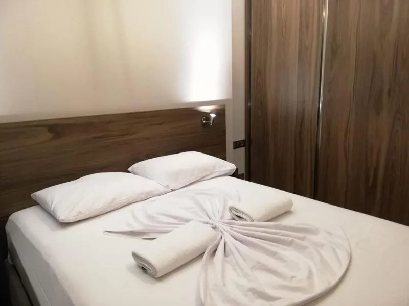 Bed in Doğan Palace Hotel