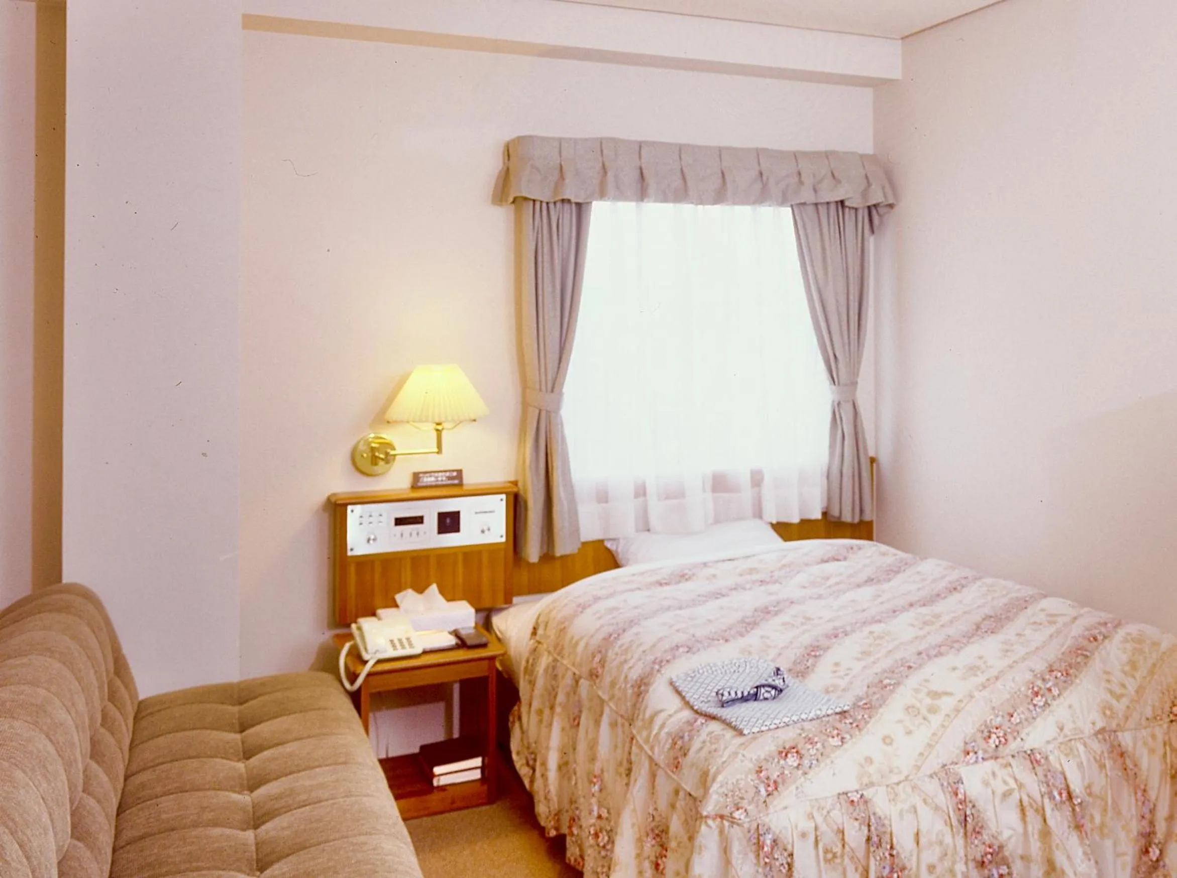 Photo of the whole room, Bed in Okayama Ekimae Universal Hotel