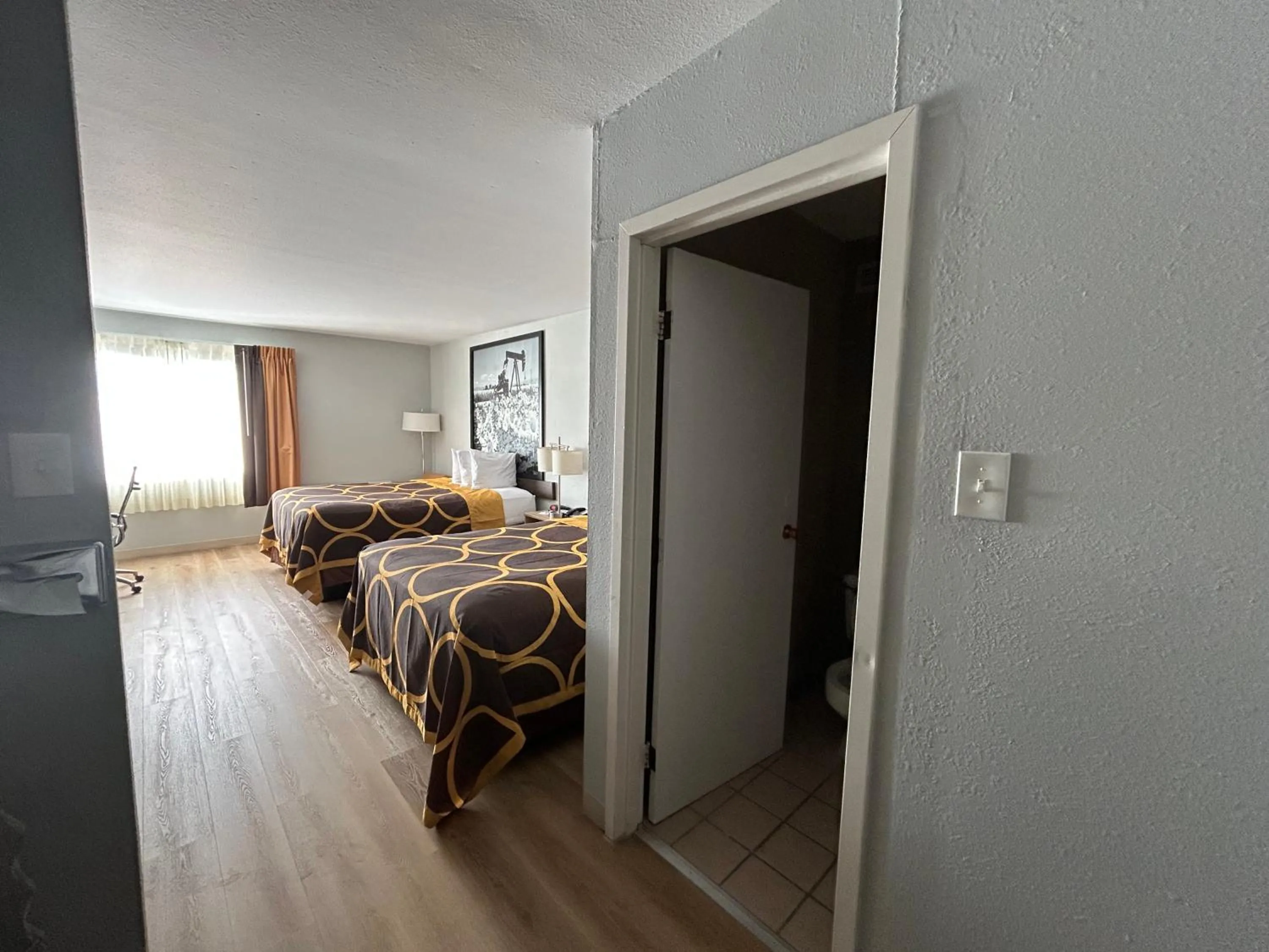 Photo of the whole room, Bed in Super 8 by Wyndham Sterling CO