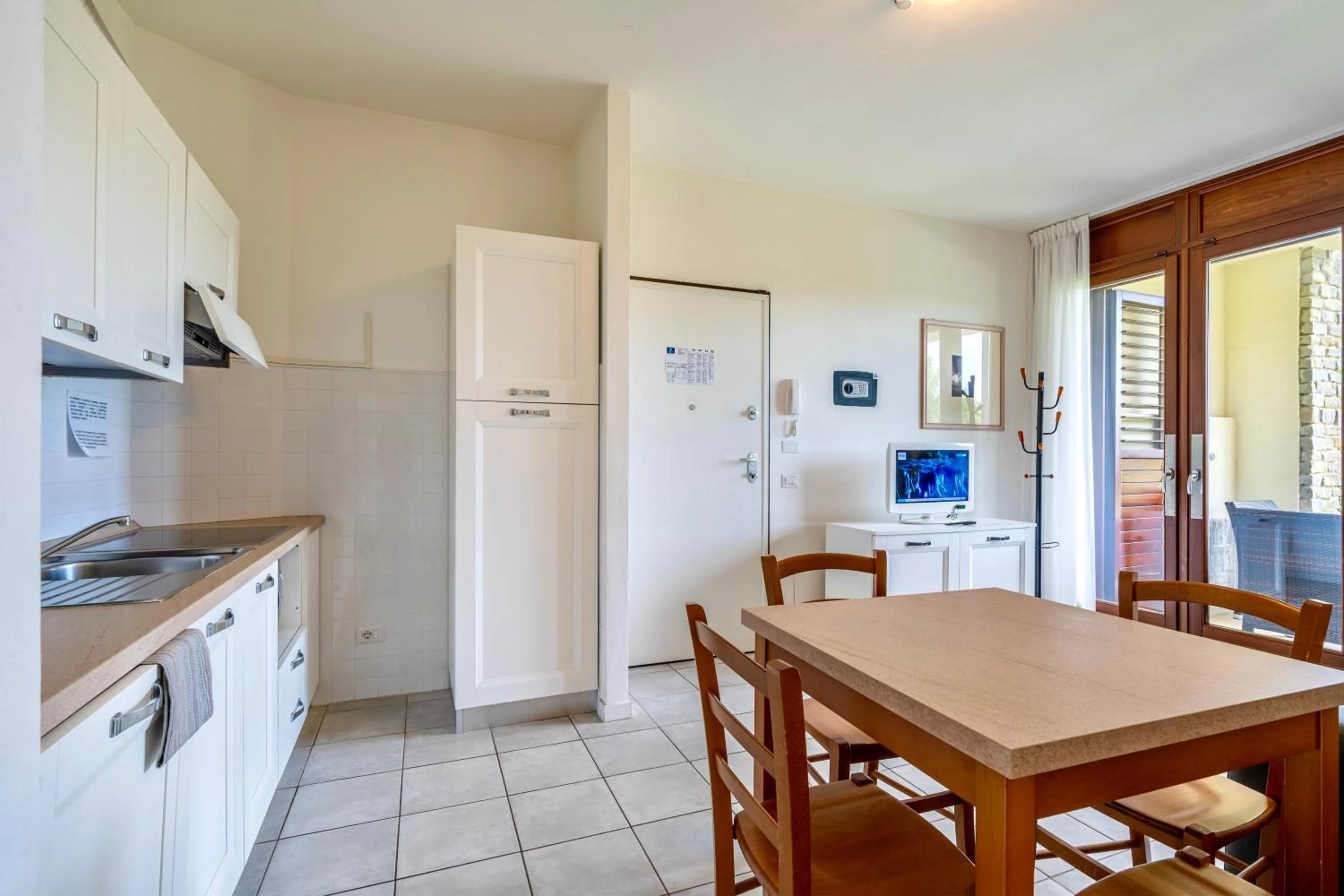 Kitchen or kitchenette in ISA-Residence with swimming-pool in Barberino-Tavernelle, apartments with air conditioning and private outdoor area