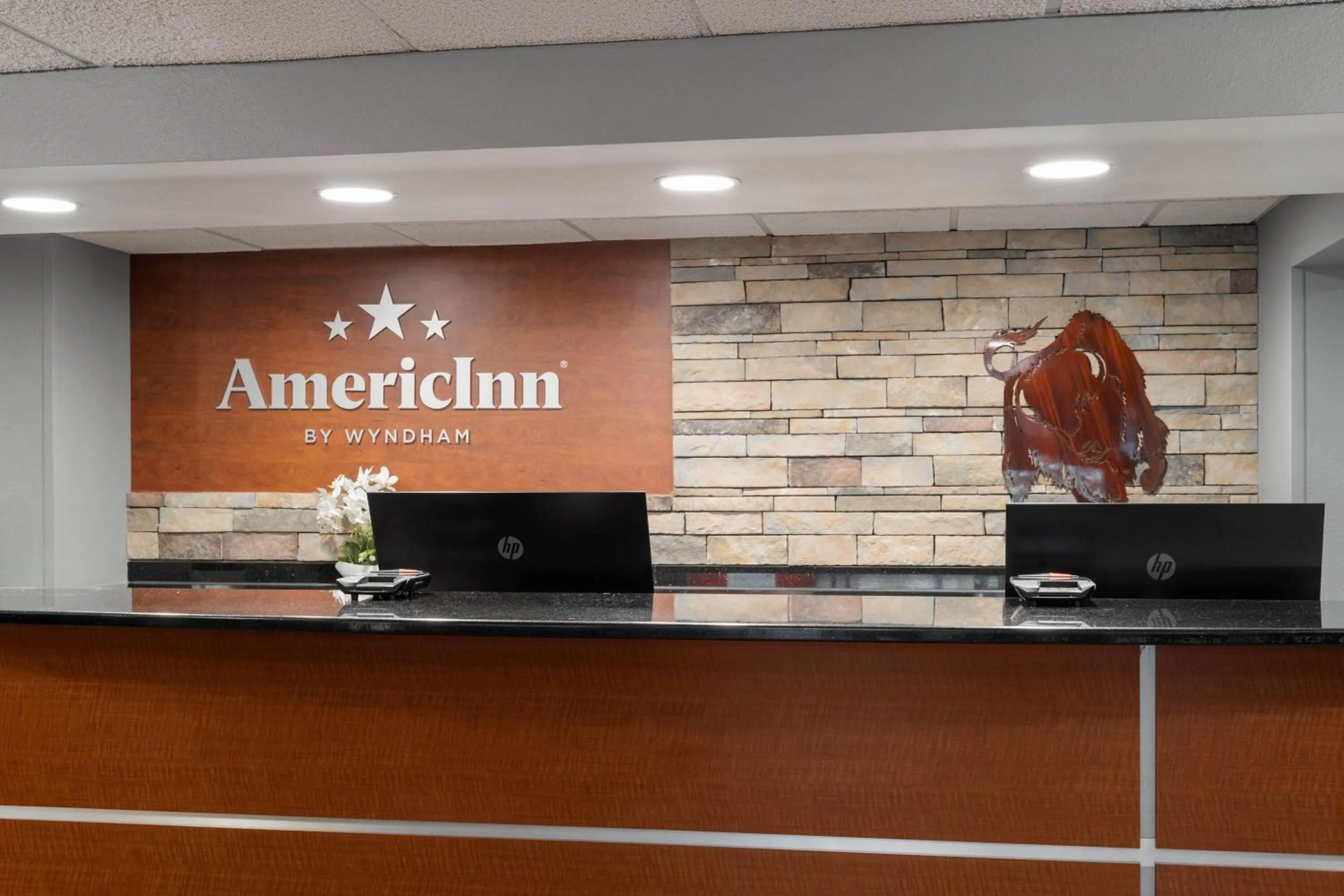 Lobby or reception in AmericInn by Wyndham Grand Forks