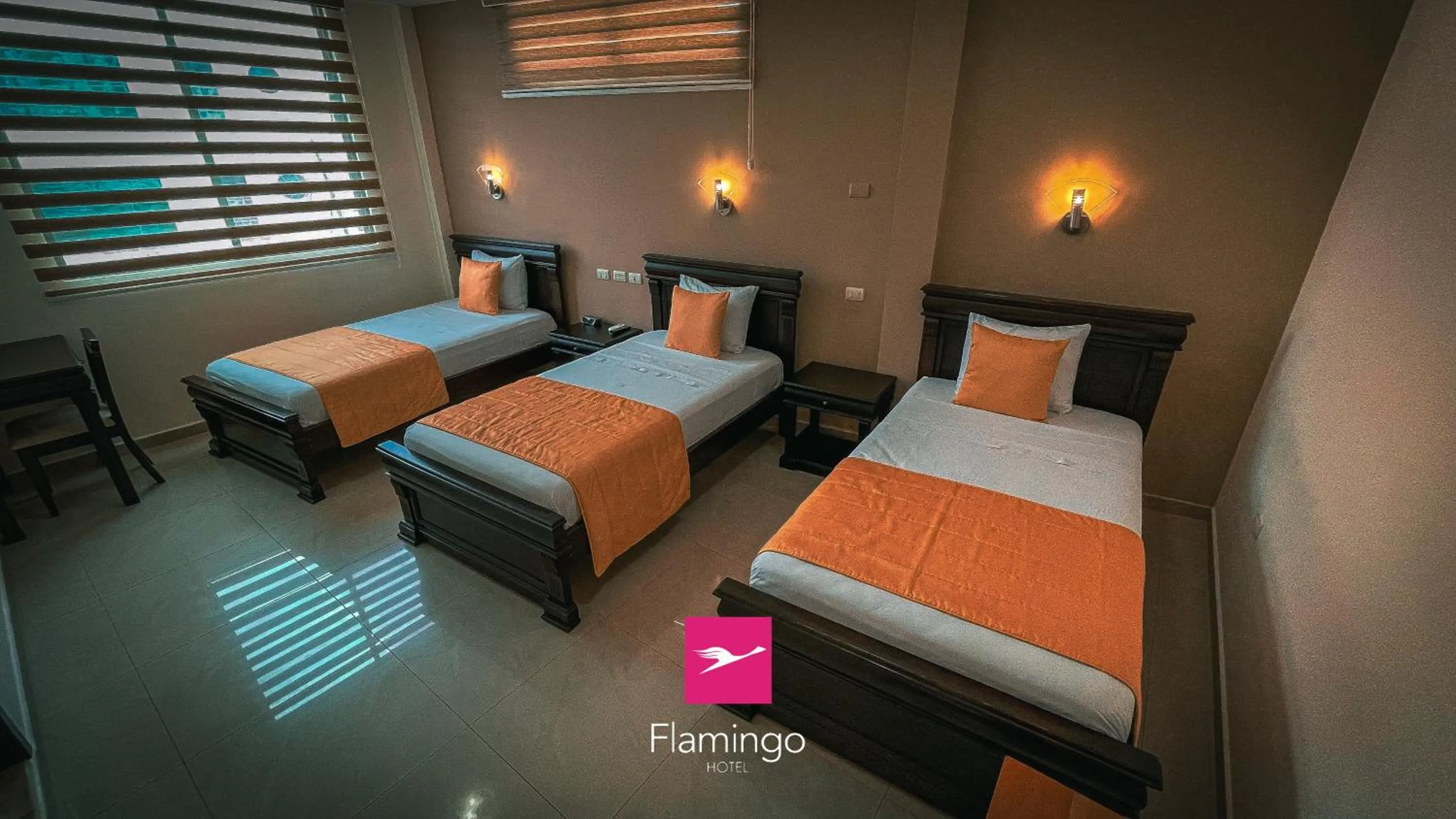 Bed in Hotel Flamingo