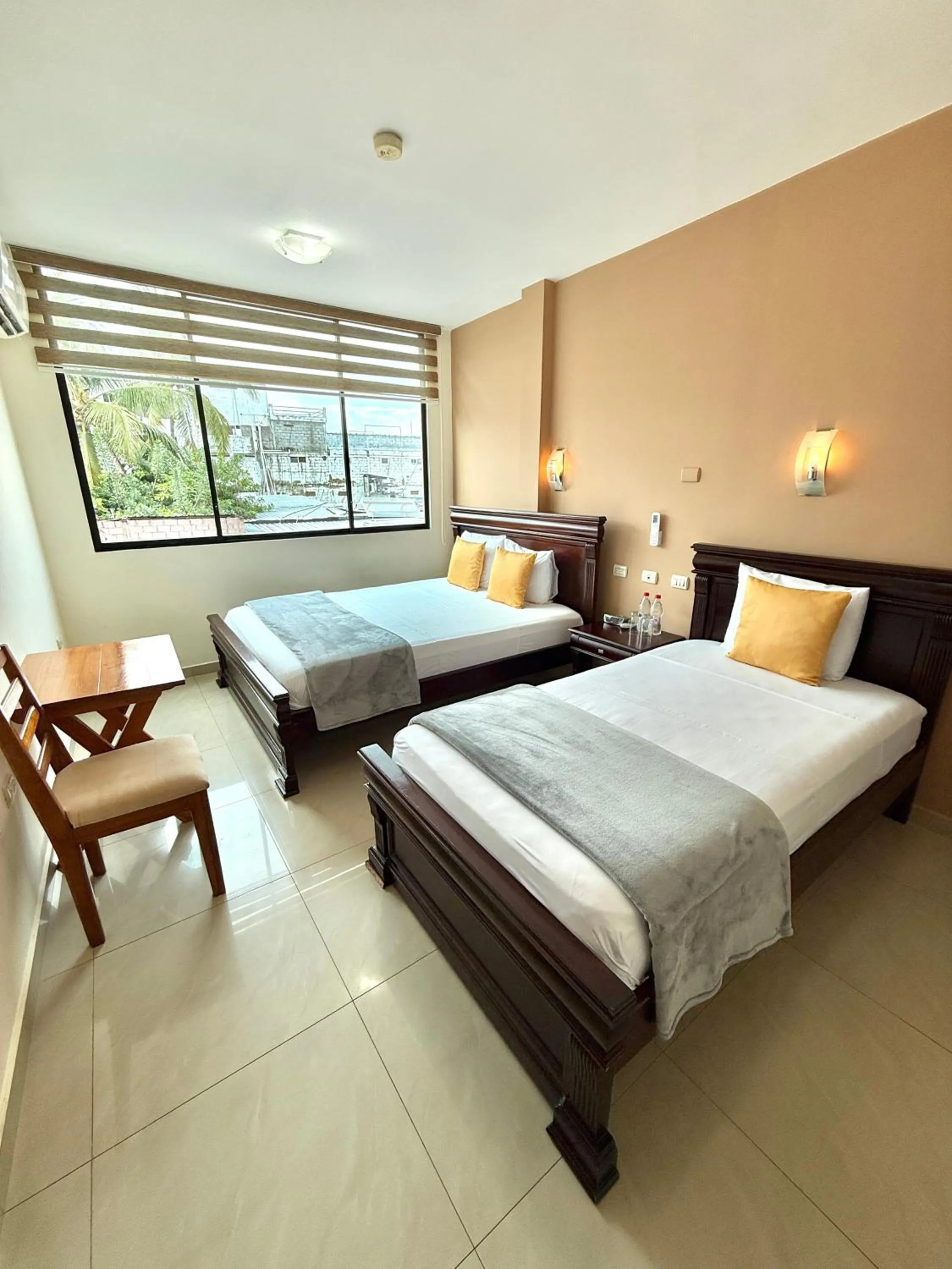 Bed in Hotel Flamingo