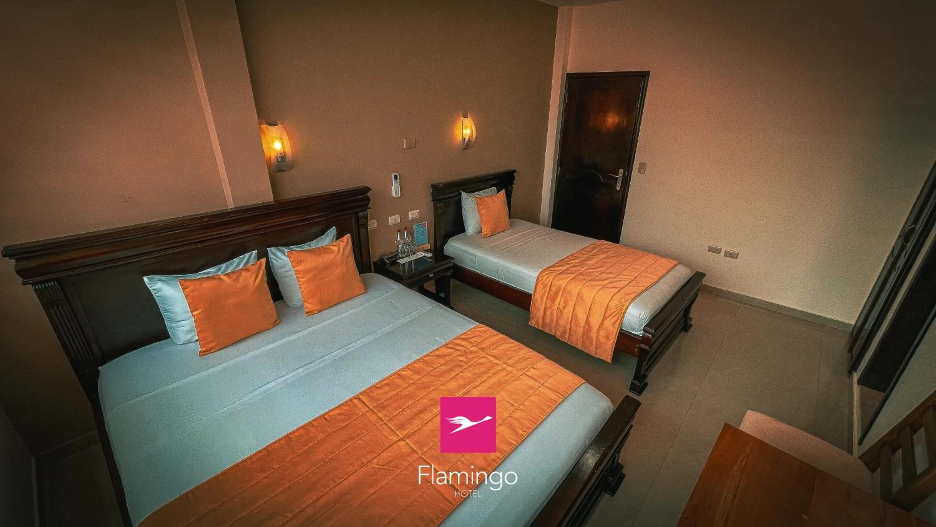 Bed in Hotel Flamingo