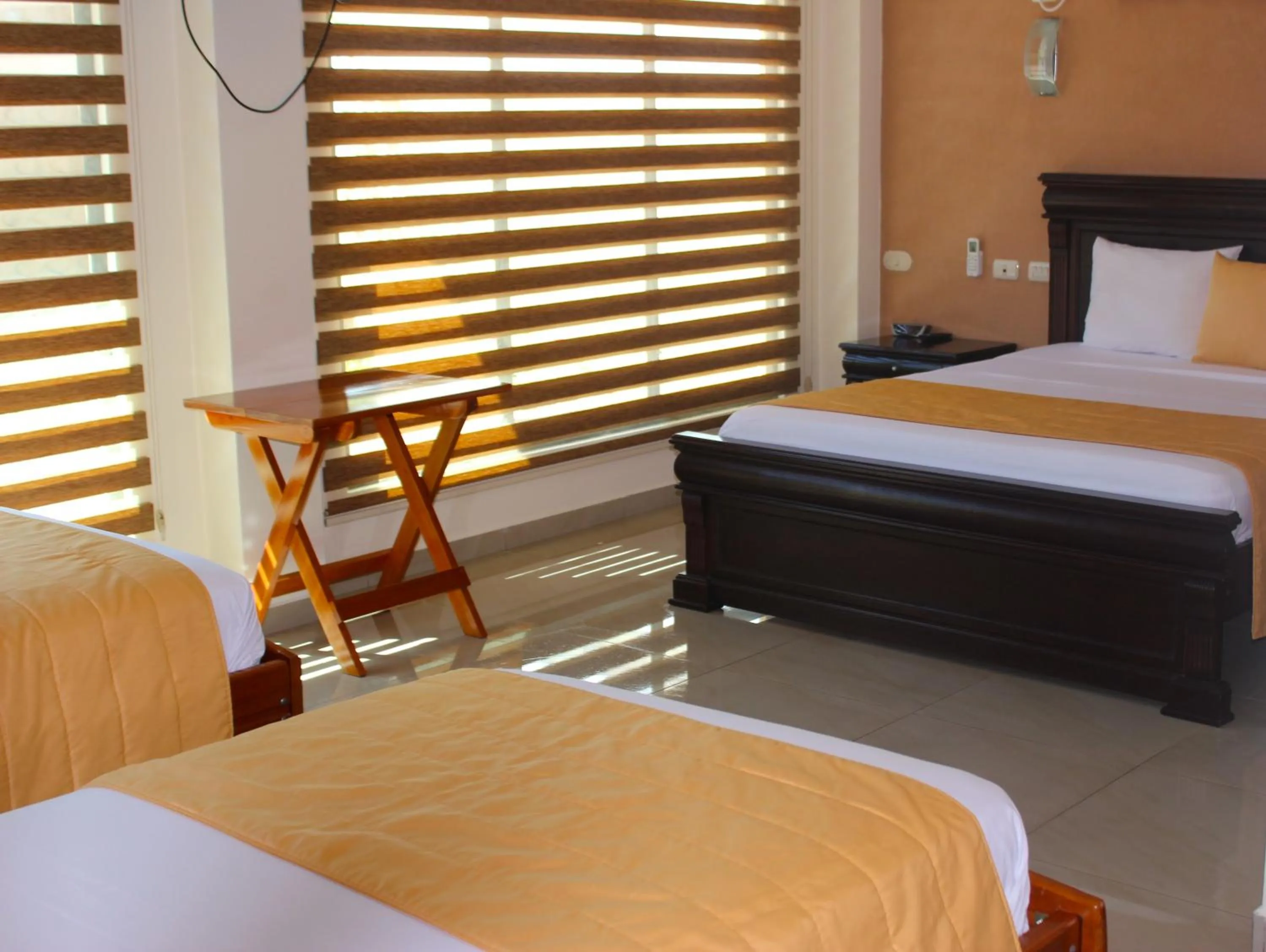 Bed in Hotel Flamingo