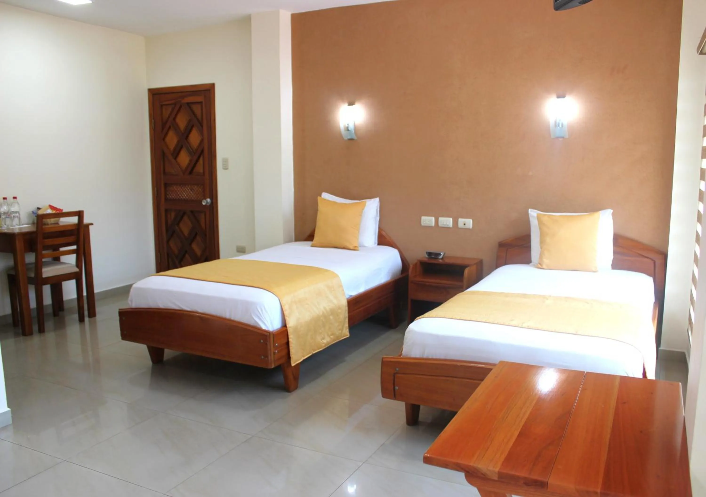 Bed in Hotel Flamingo