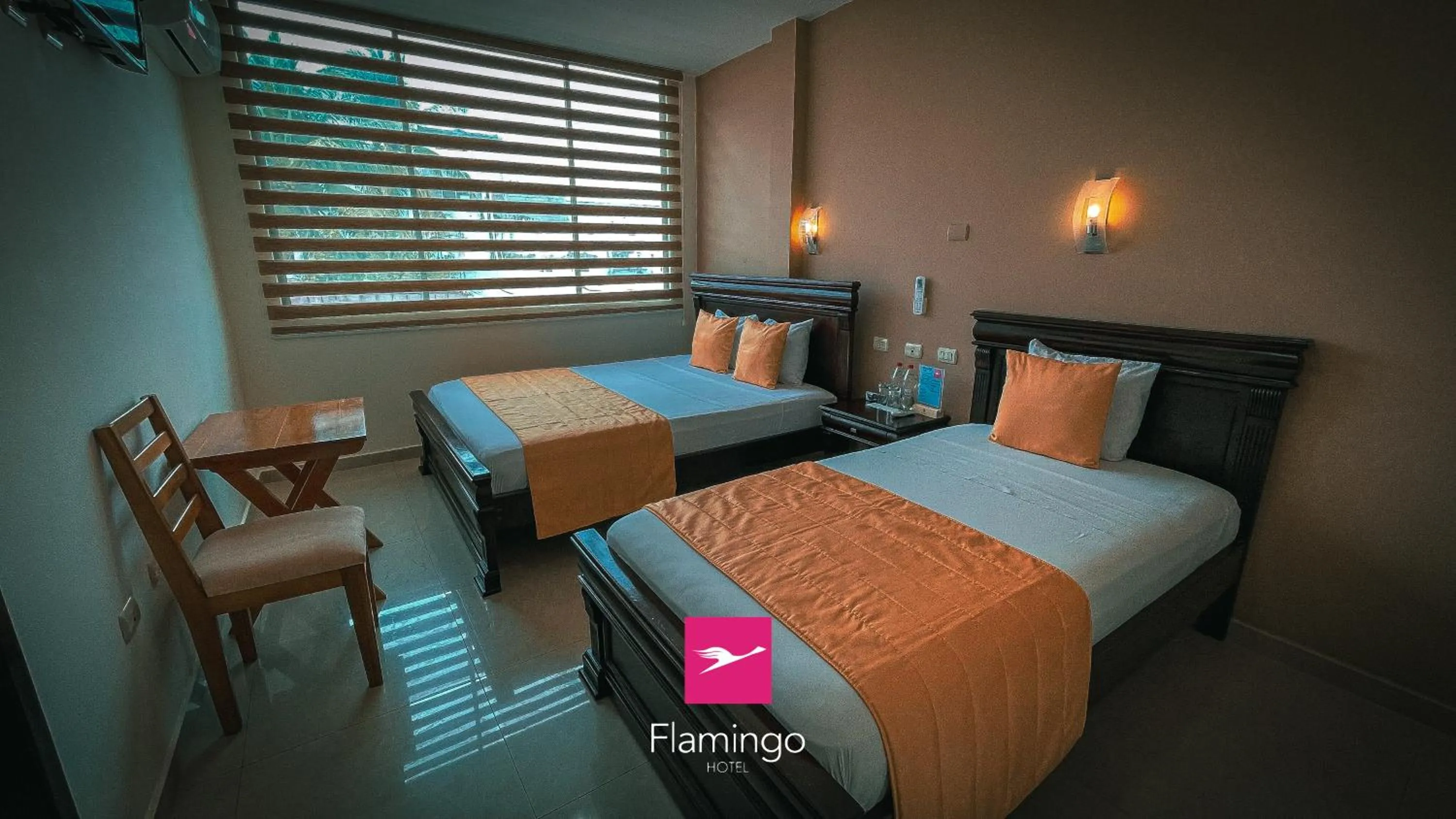 Bed in Hotel Flamingo
