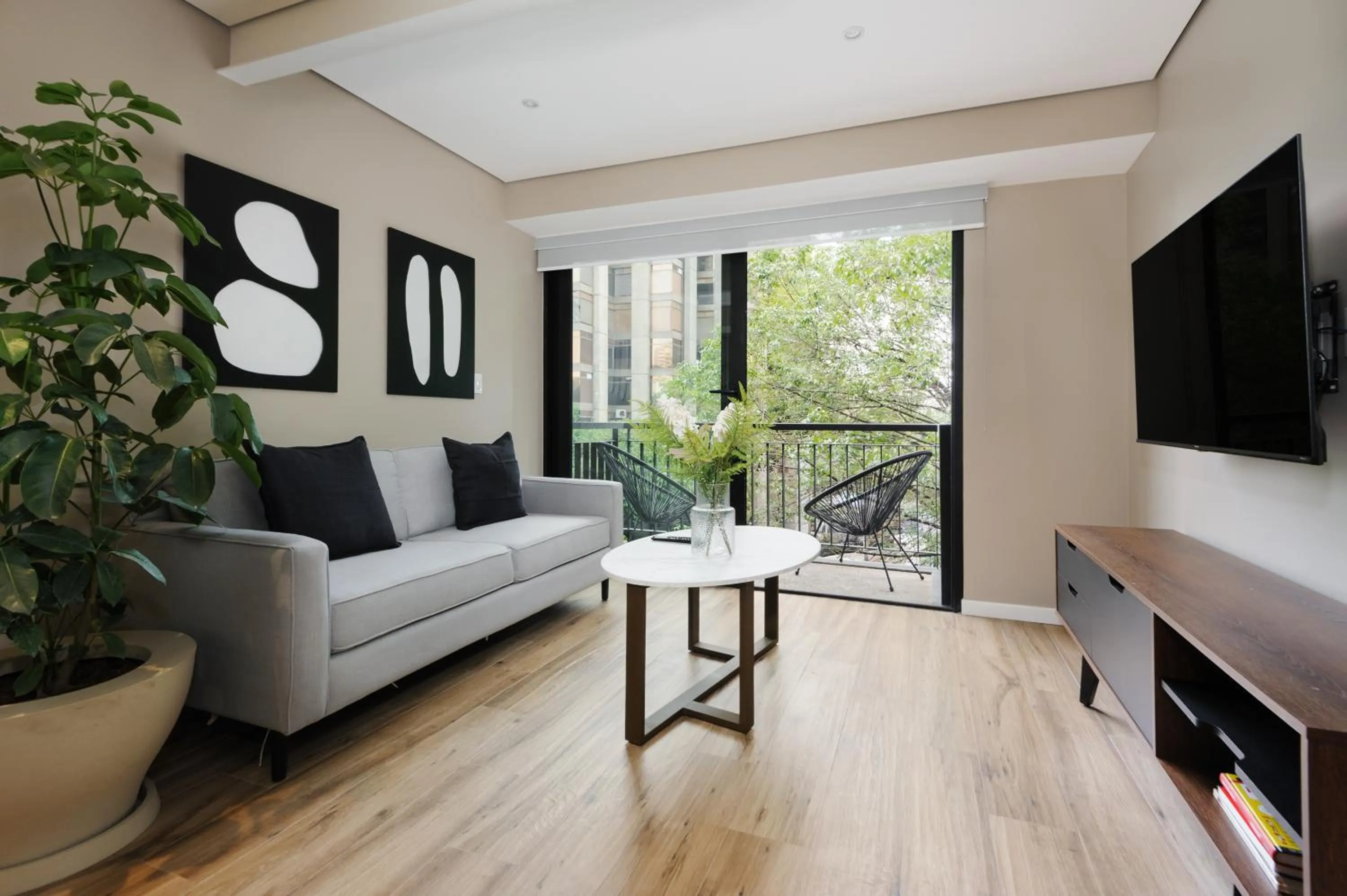 Living room in Nuevo Leon 155 by Wynwood House