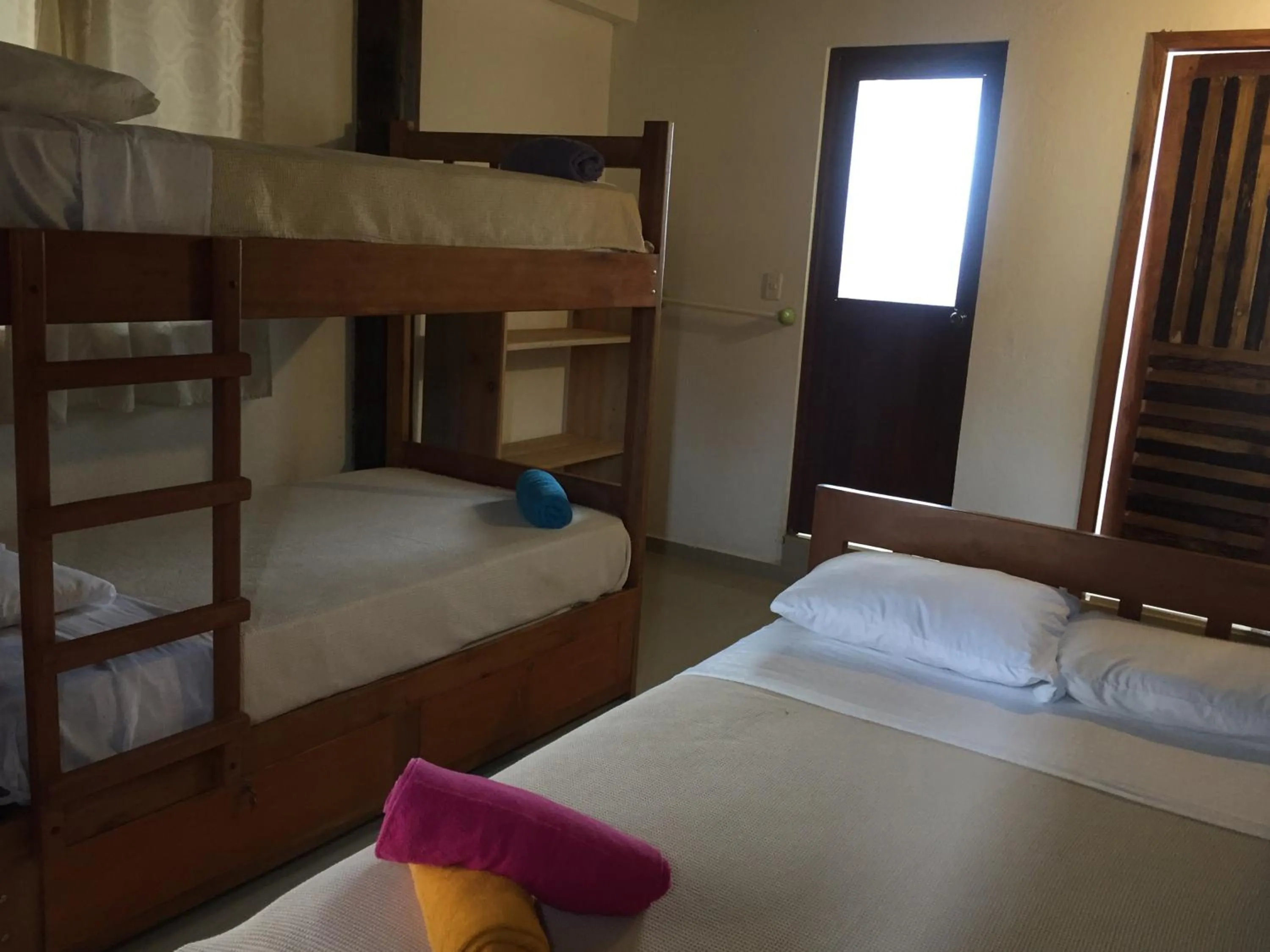 Quadruple Room with Balcony - single occupancy in La Facha Hostal Restaurant Surf