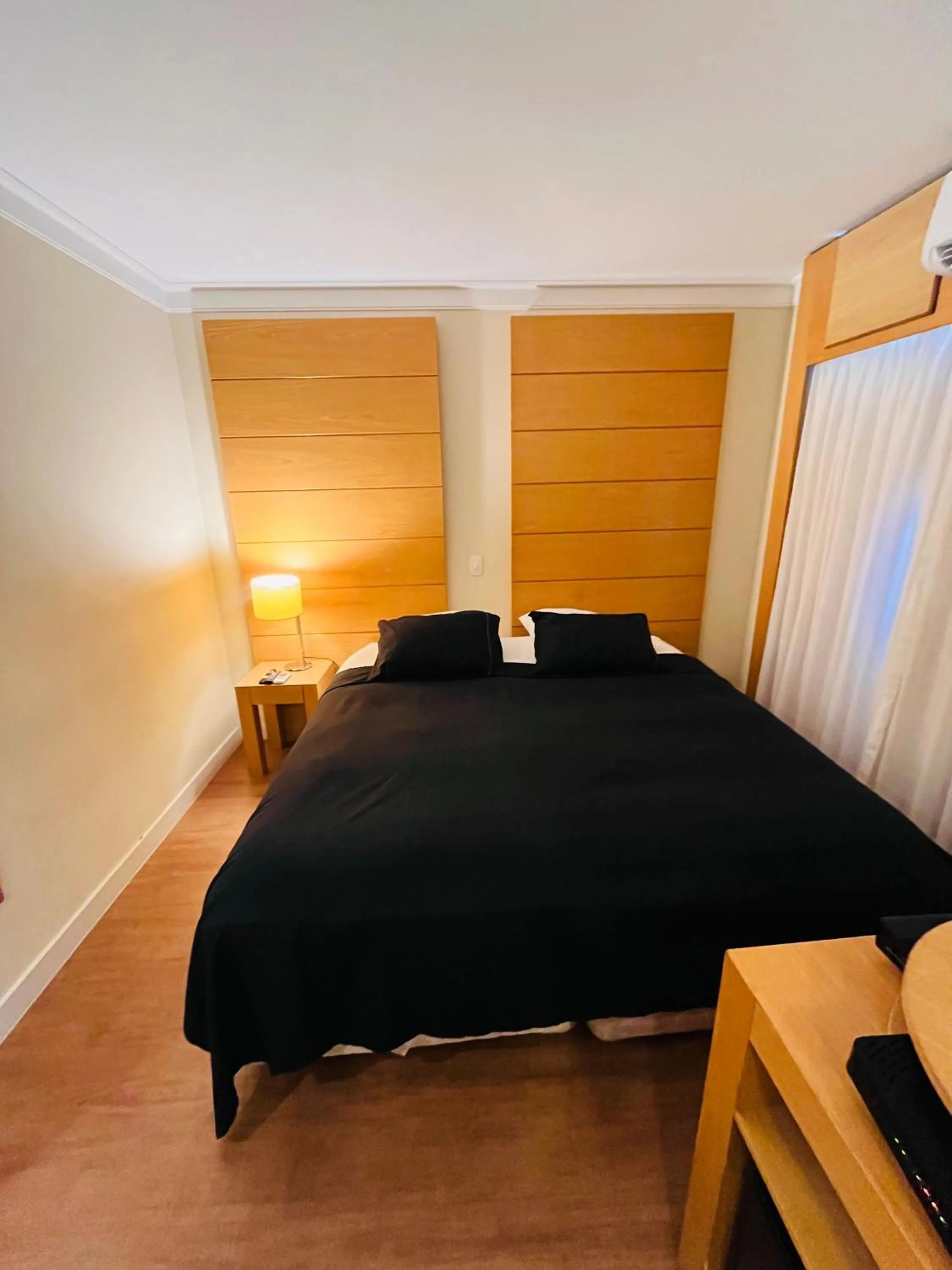 Bed in Quarto de hotel de luxo Congonhas