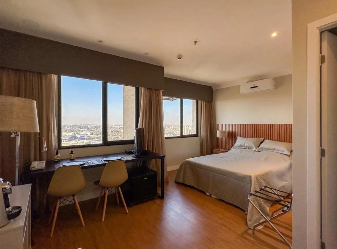 Bed in Quarto de hotel de luxo Congonhas