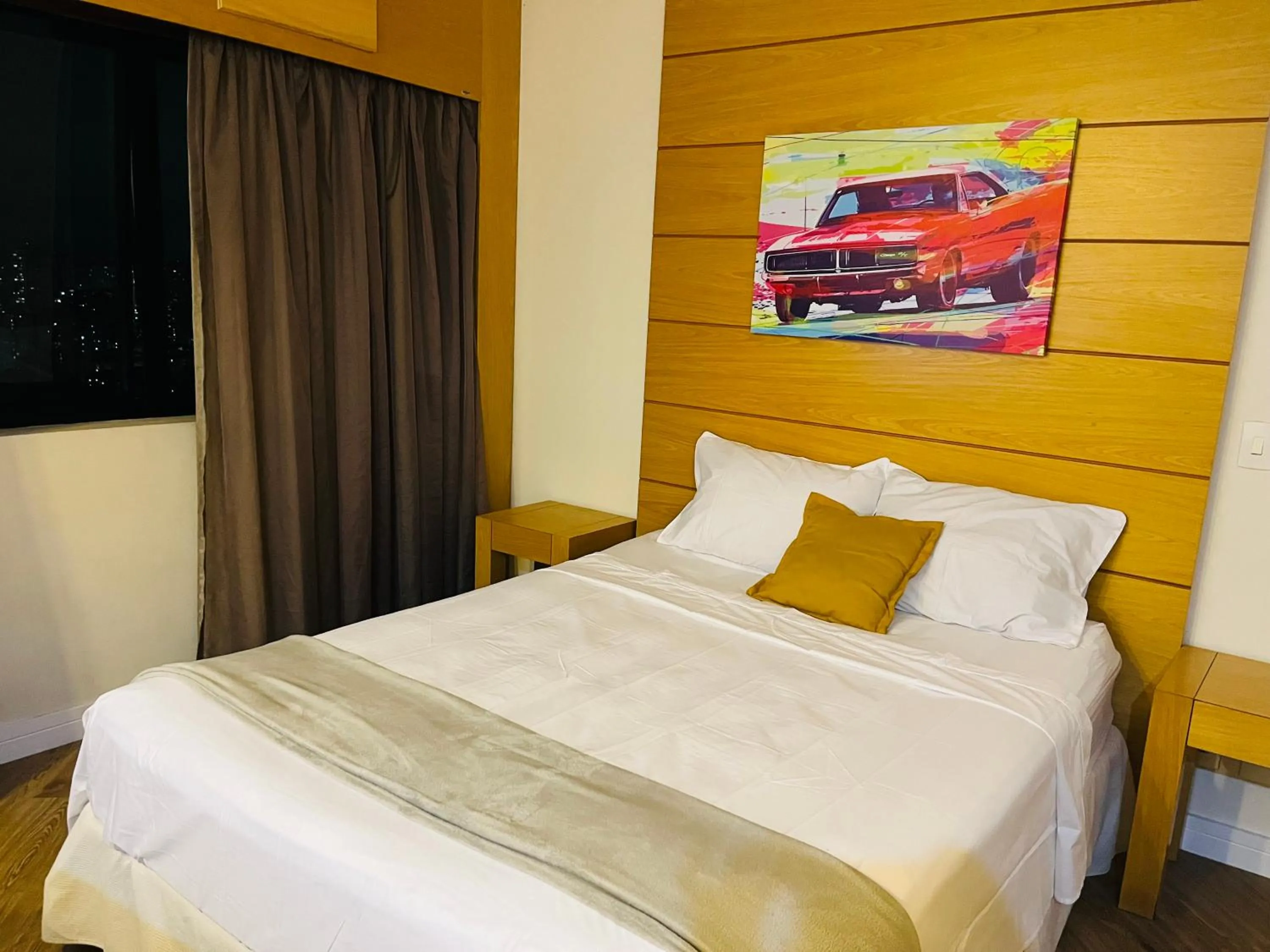 Bed in Quarto de hotel de luxo Congonhas