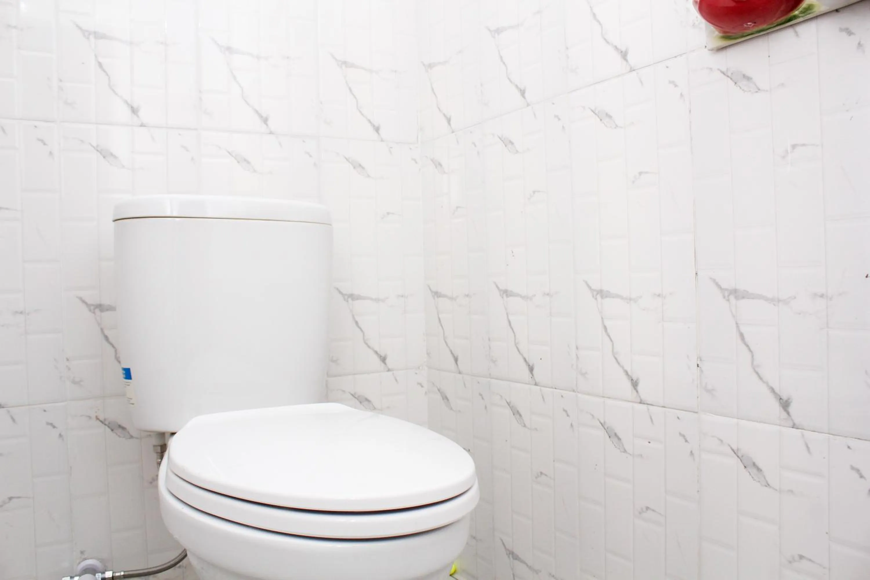 Bathroom in RedDoorz Syariah near Kawasan Wisata Gunung Prau Dieng