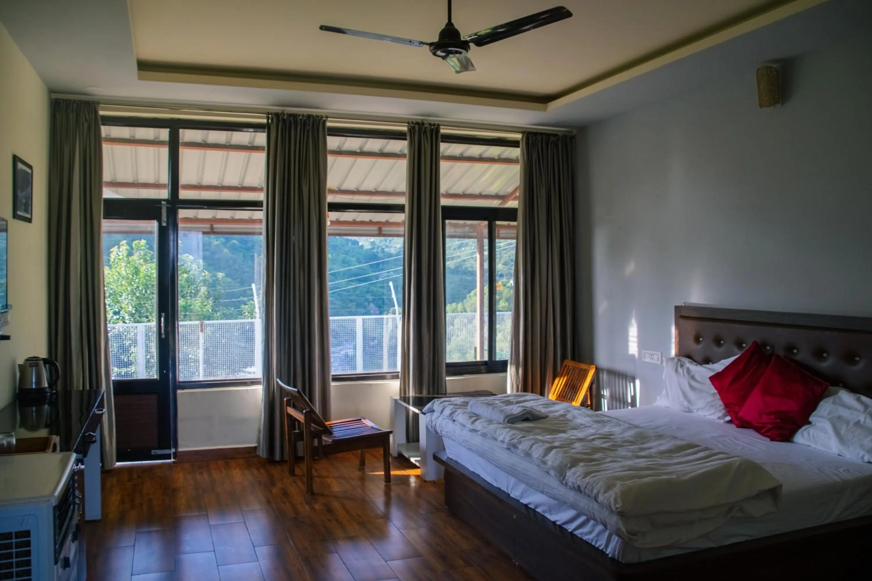 Bed in Dhauladhar View Village Resort