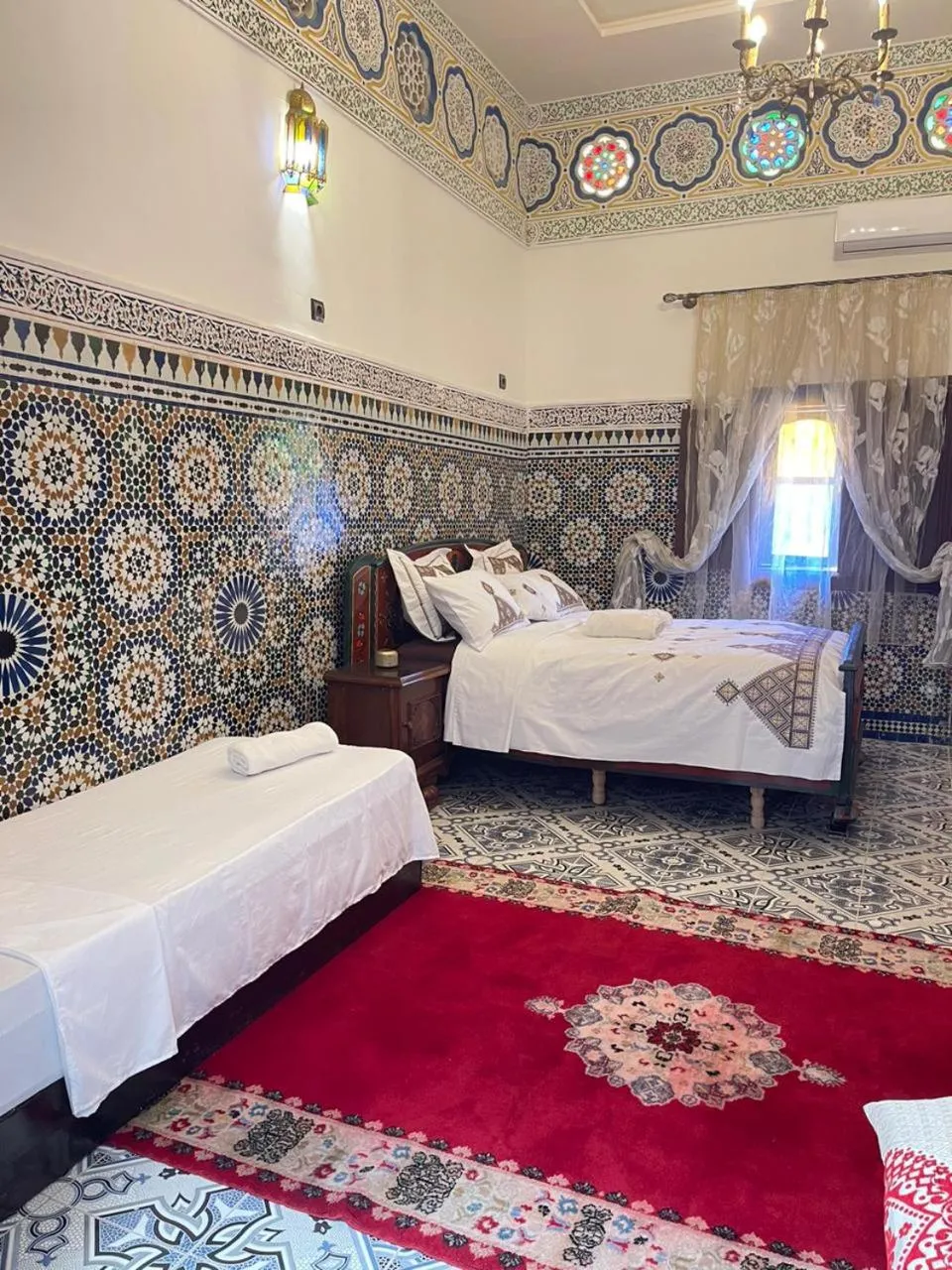 Bed in Riad Blue Oasis