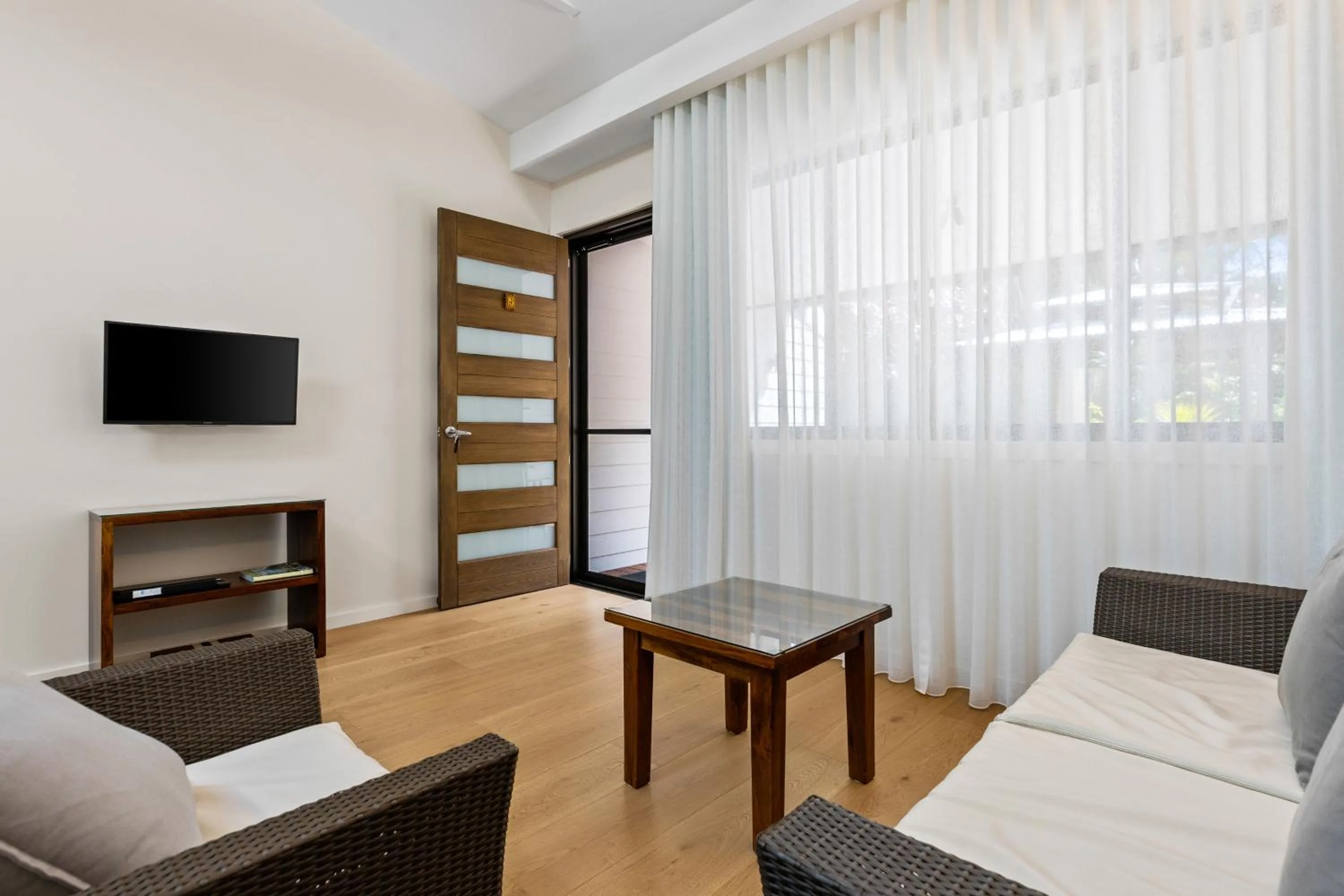 Living room, Bed in Lorhiti Apartments