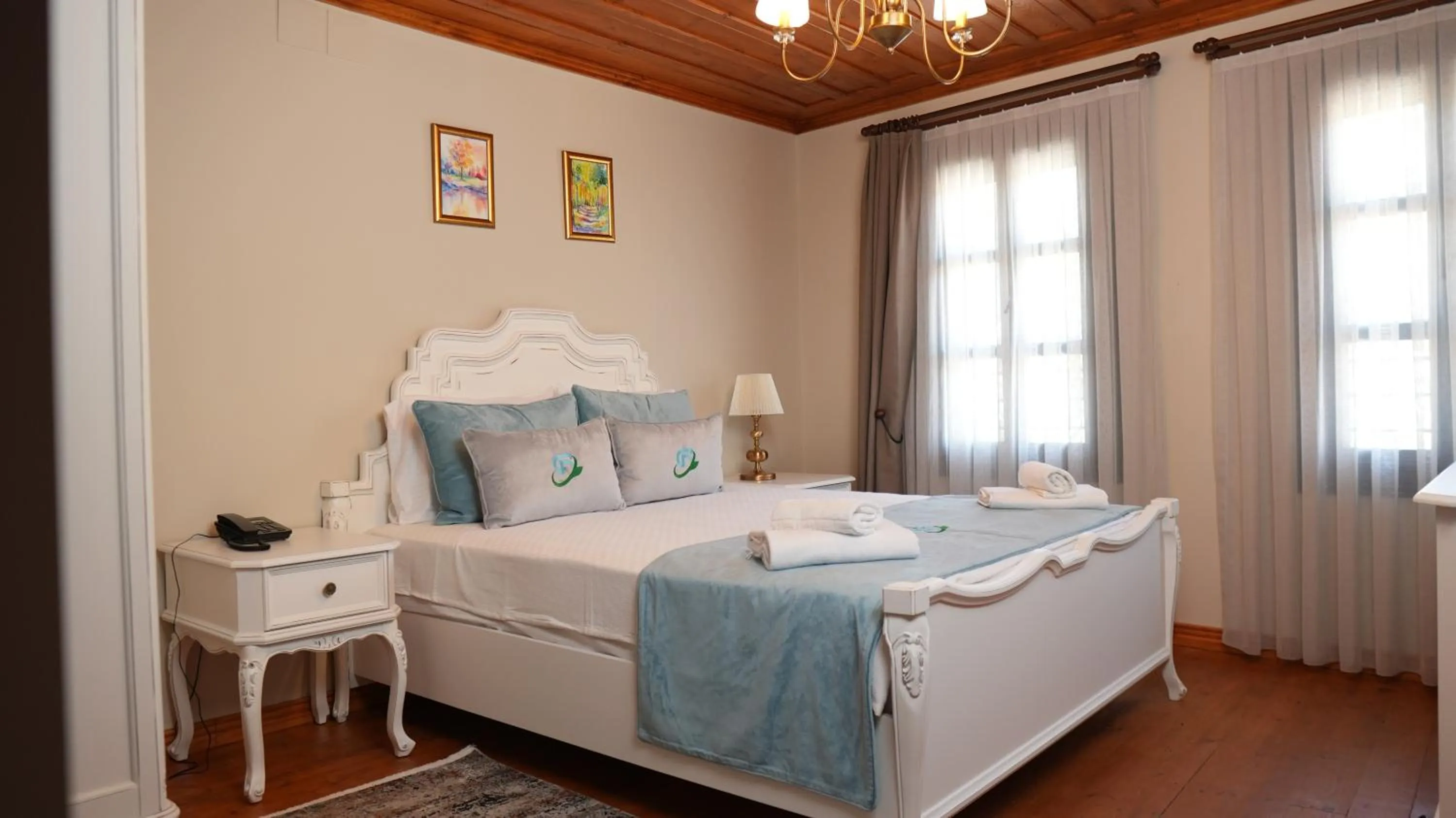 Bed in Domatia Stone Hotel