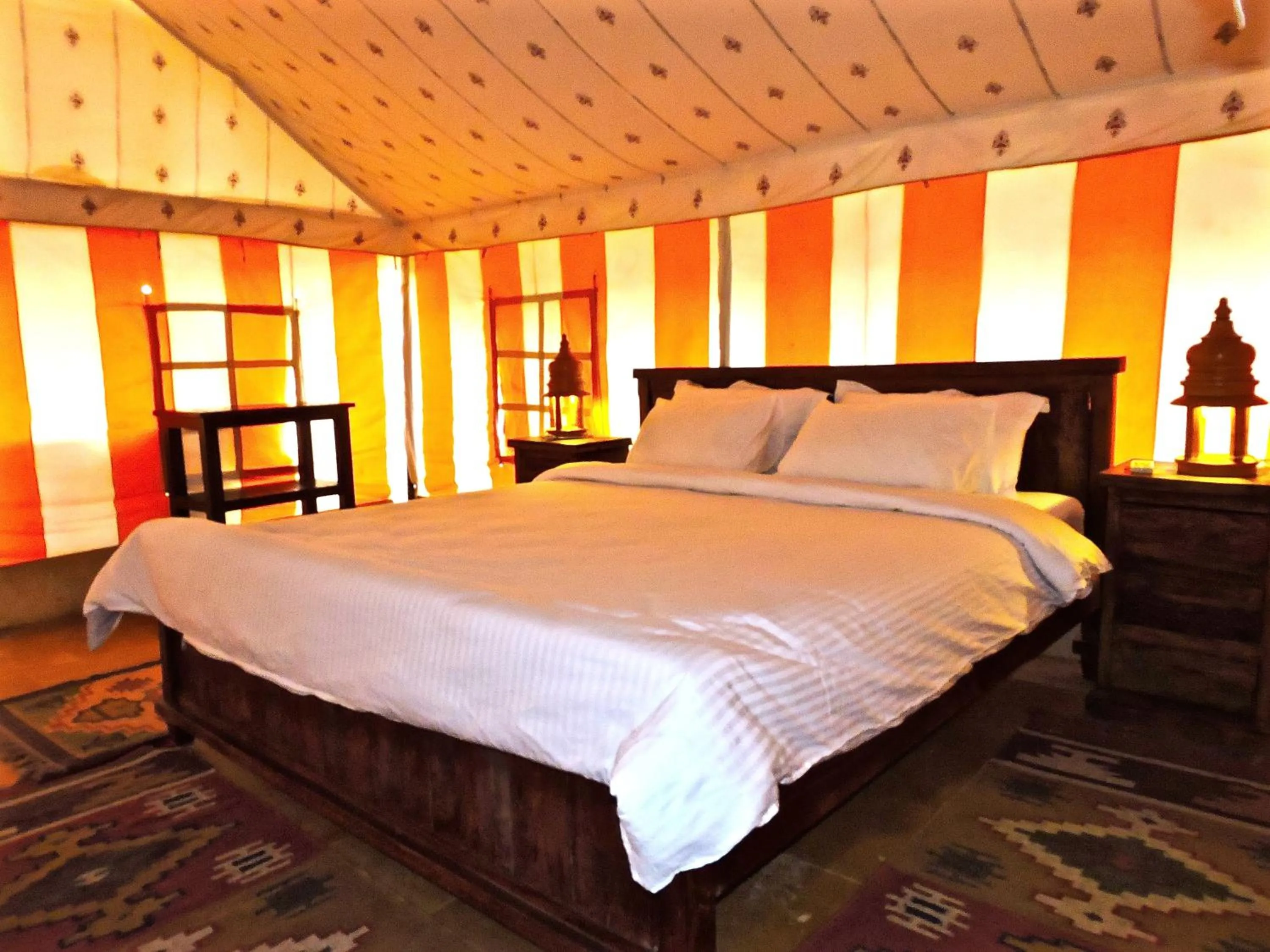 Bed in Damodra Desert Camp