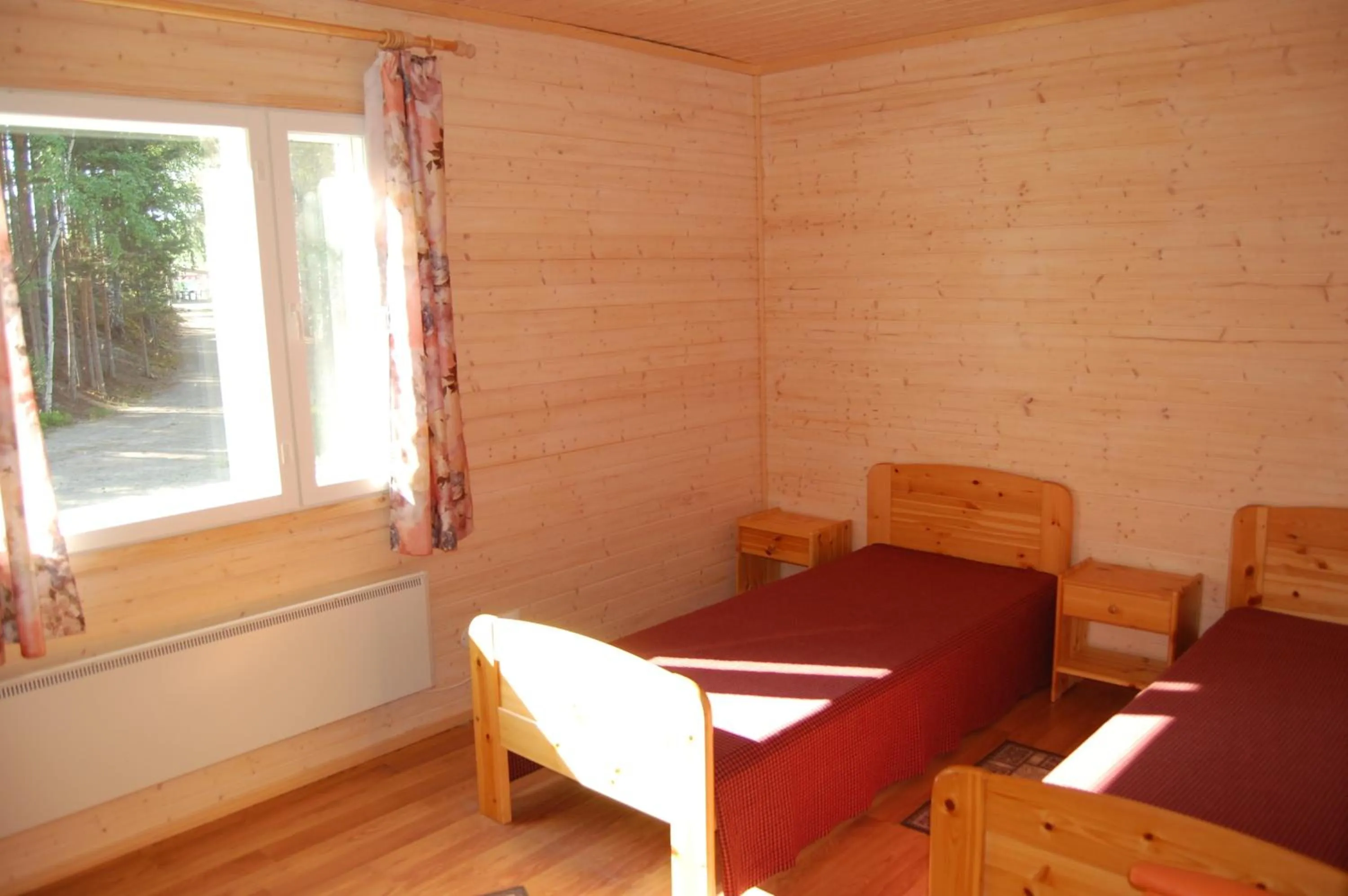 Bedroom in Lomasaaret Cottages