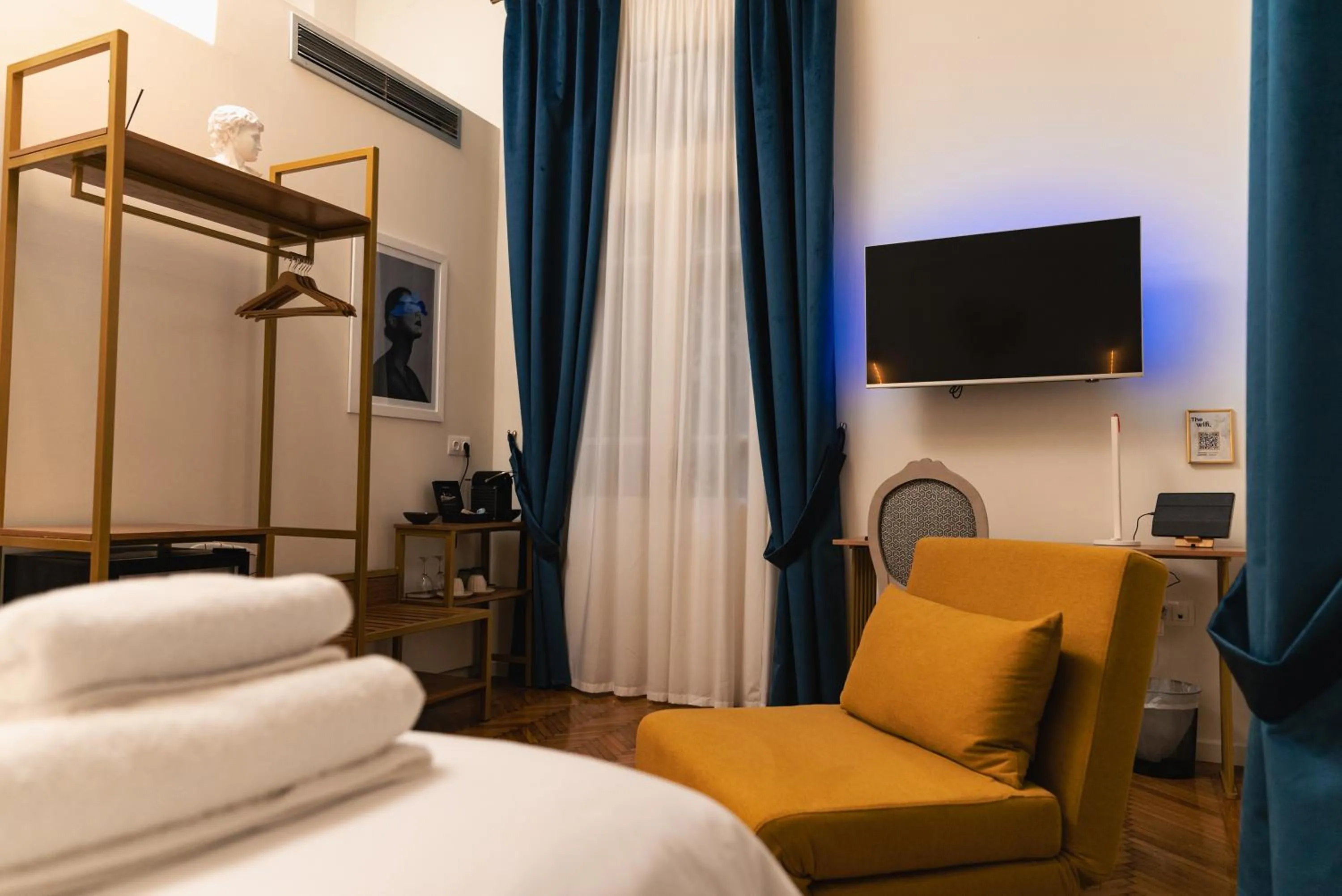 Bed in Villa Clio, a Luxury Collection