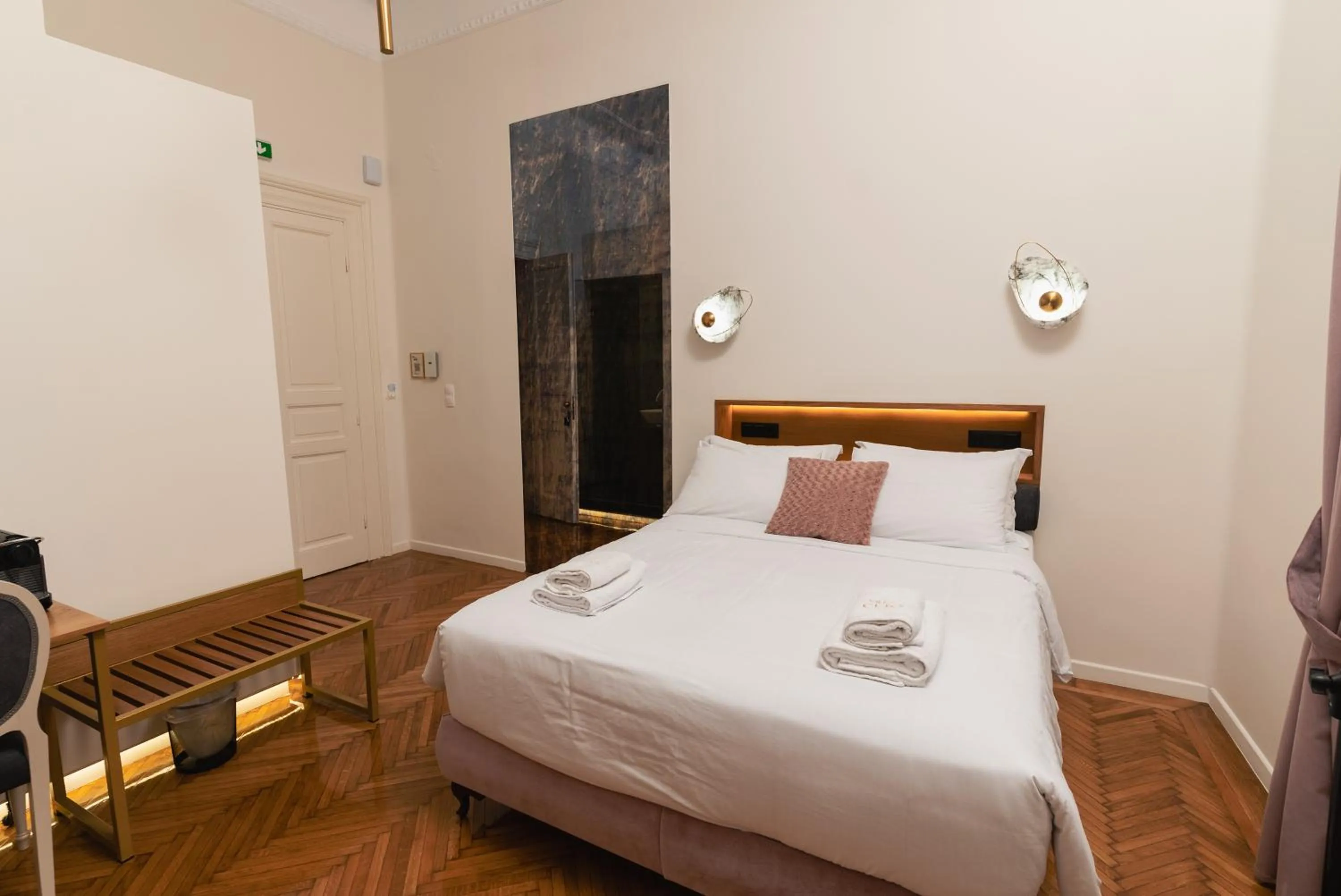 Bed in Villa Clio, a Luxury Collection