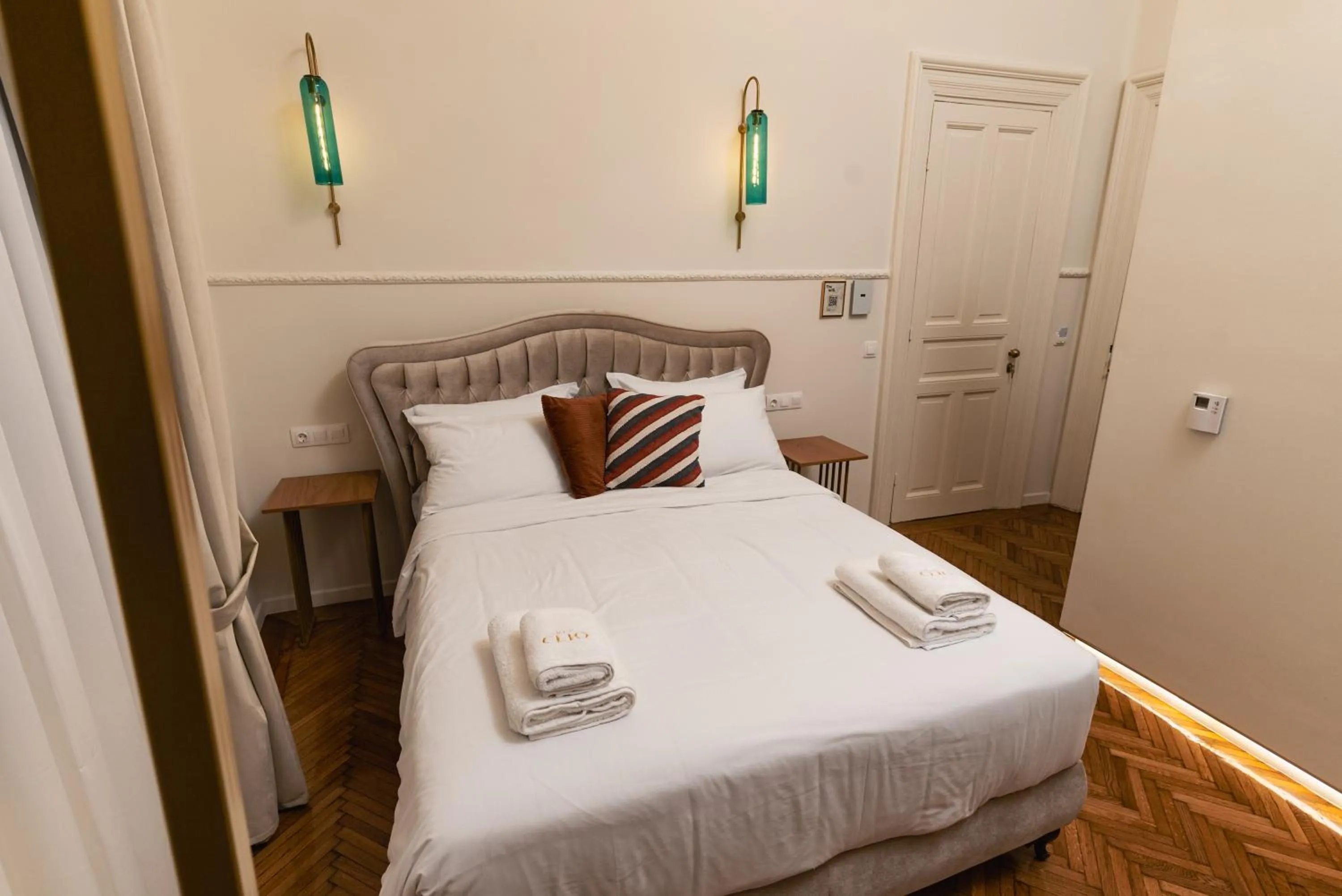 Bed in Villa Clio, a Luxury Collection