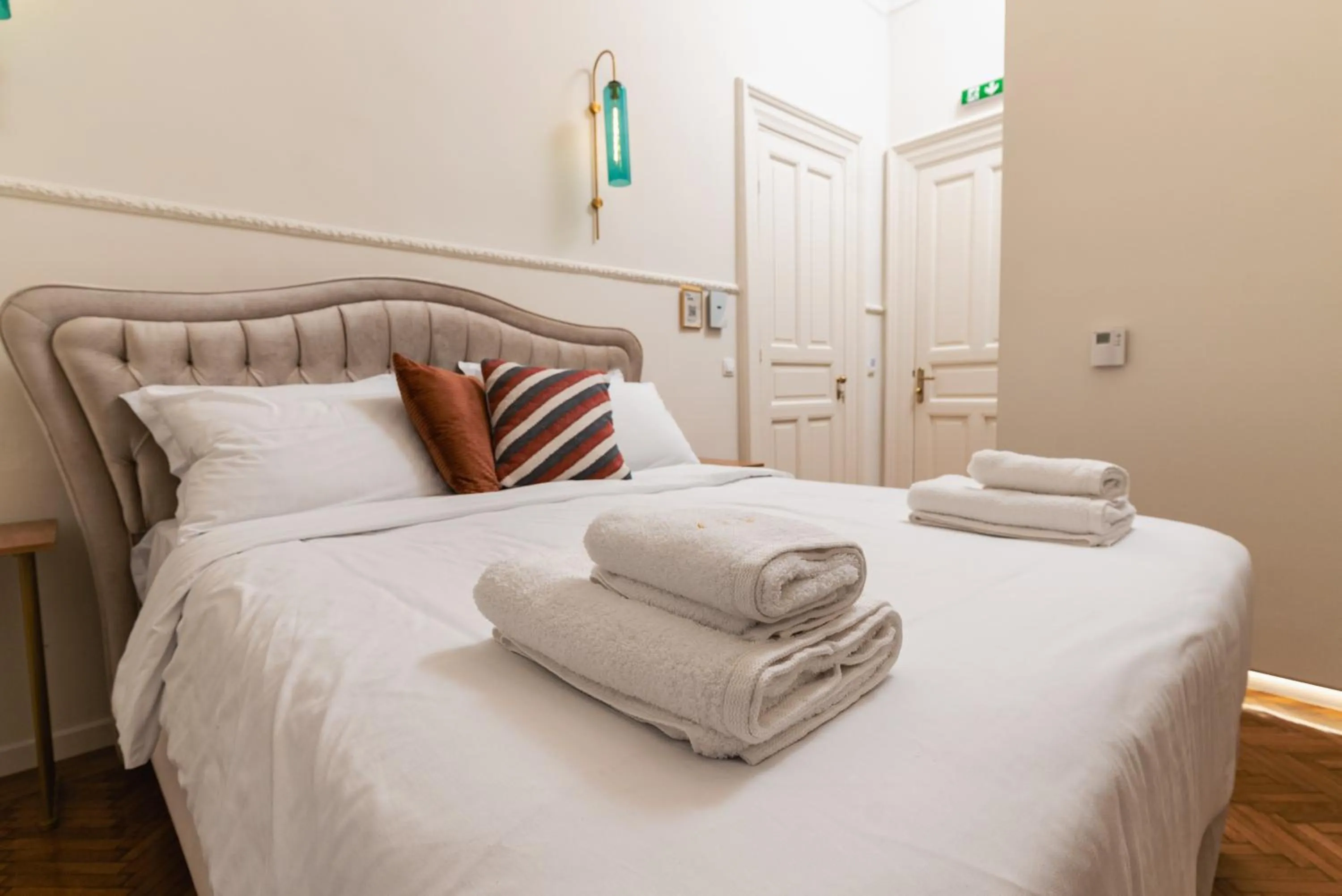 Bed in Villa Clio, a Luxury Collection