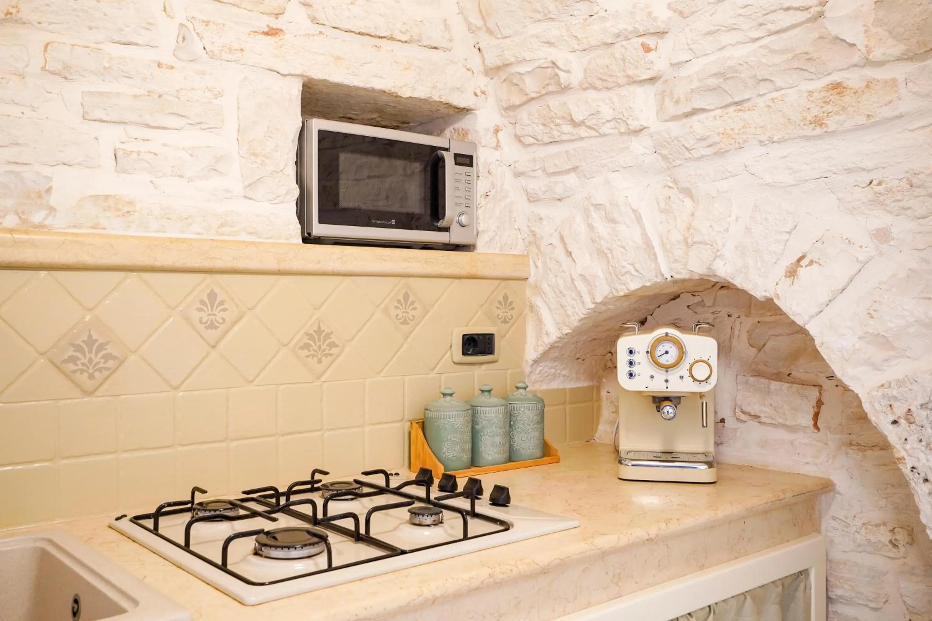 Kitchen or kitchenette in Trulli di Zia Vittoria