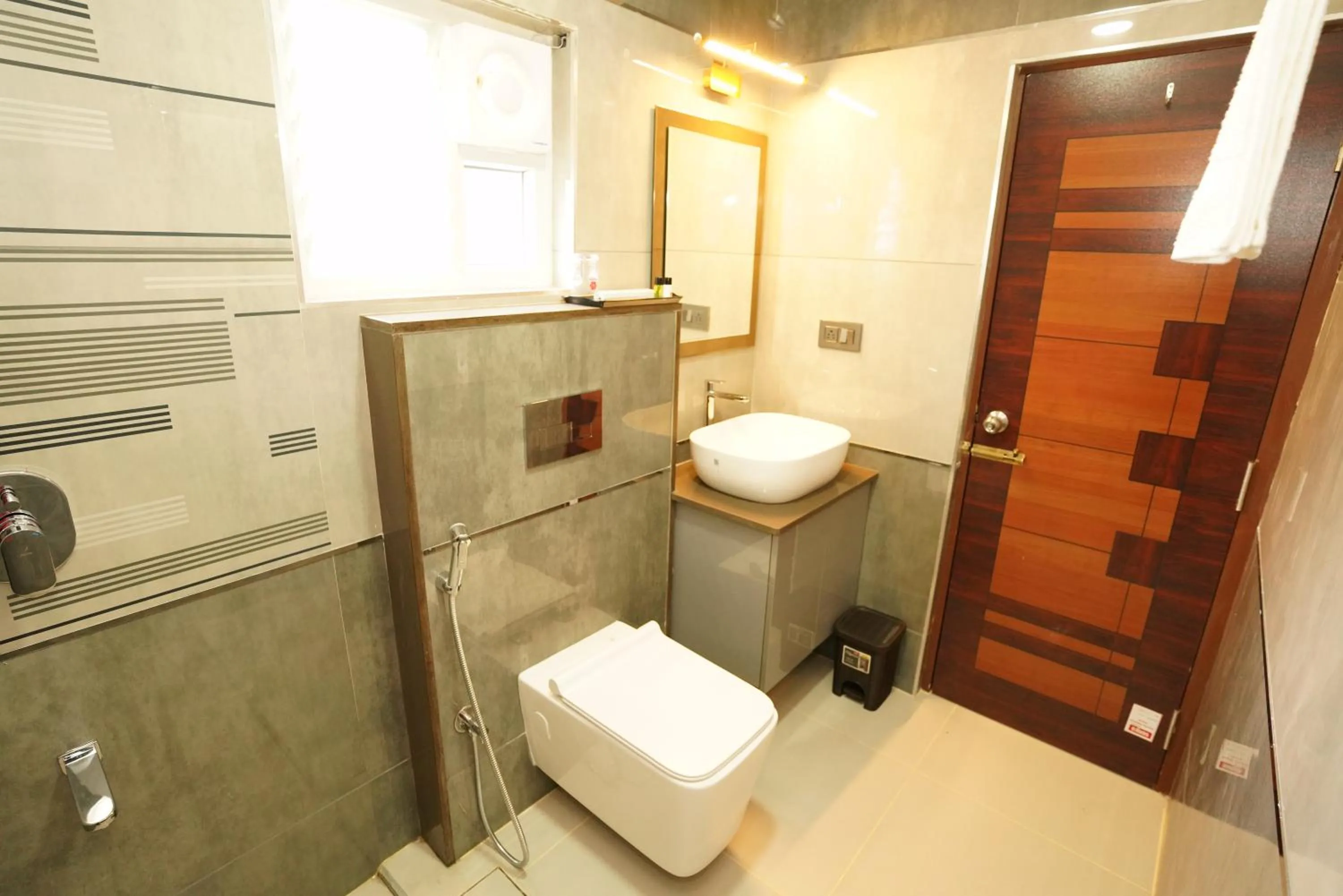 Bathroom in Saavees Residency