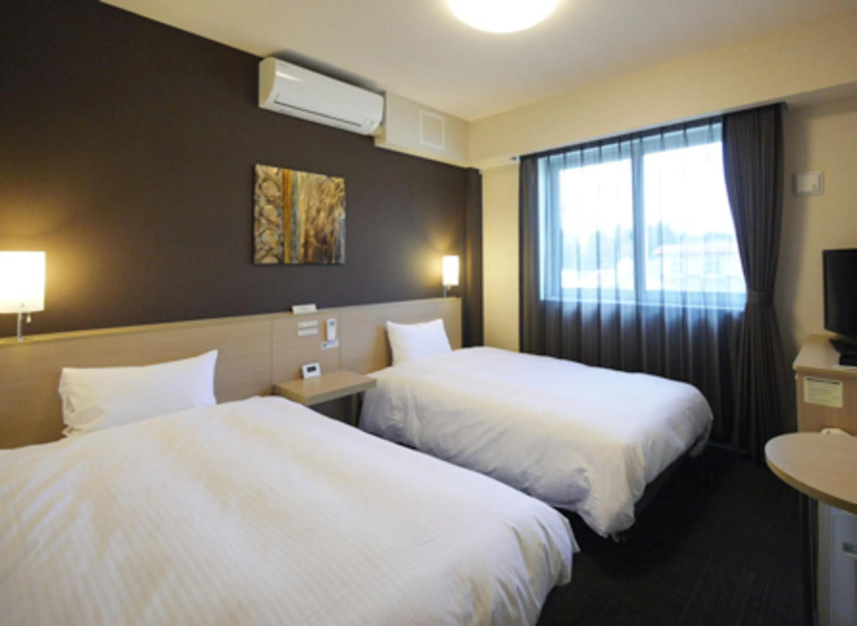 Bed in Hotel Route Inn Kesennuma Chuo Inter