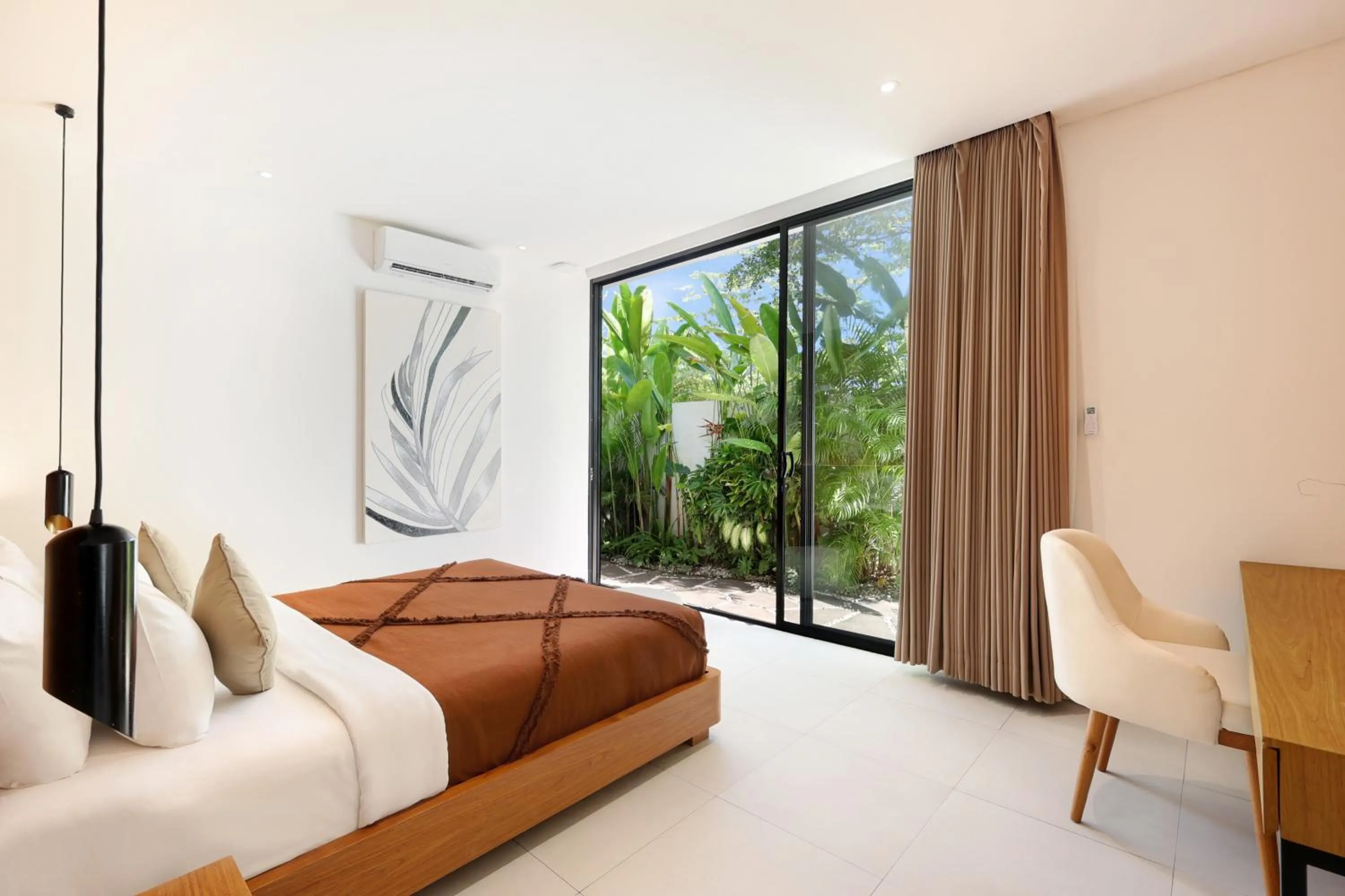 Bed in Garden Villa Pererenan by BREIG