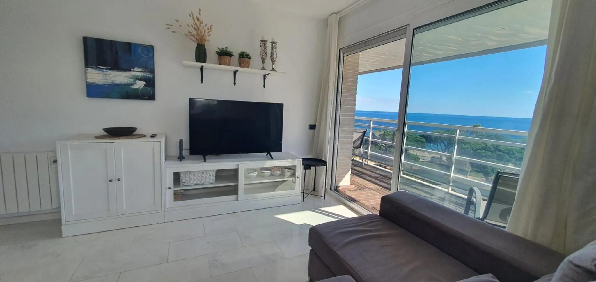 Ático con gran terraza y vistas al mar
