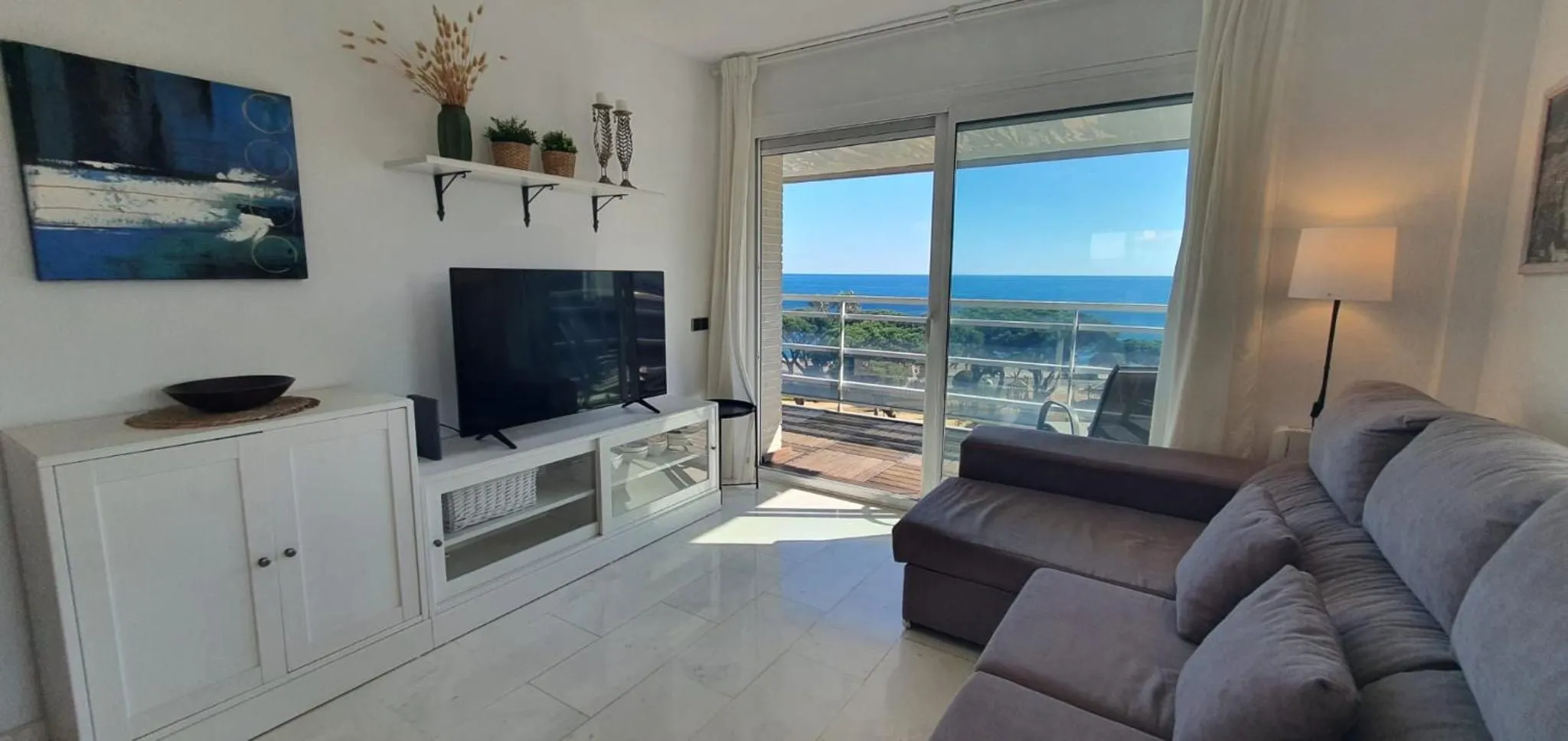 Ático con gran terraza y vistas al mar