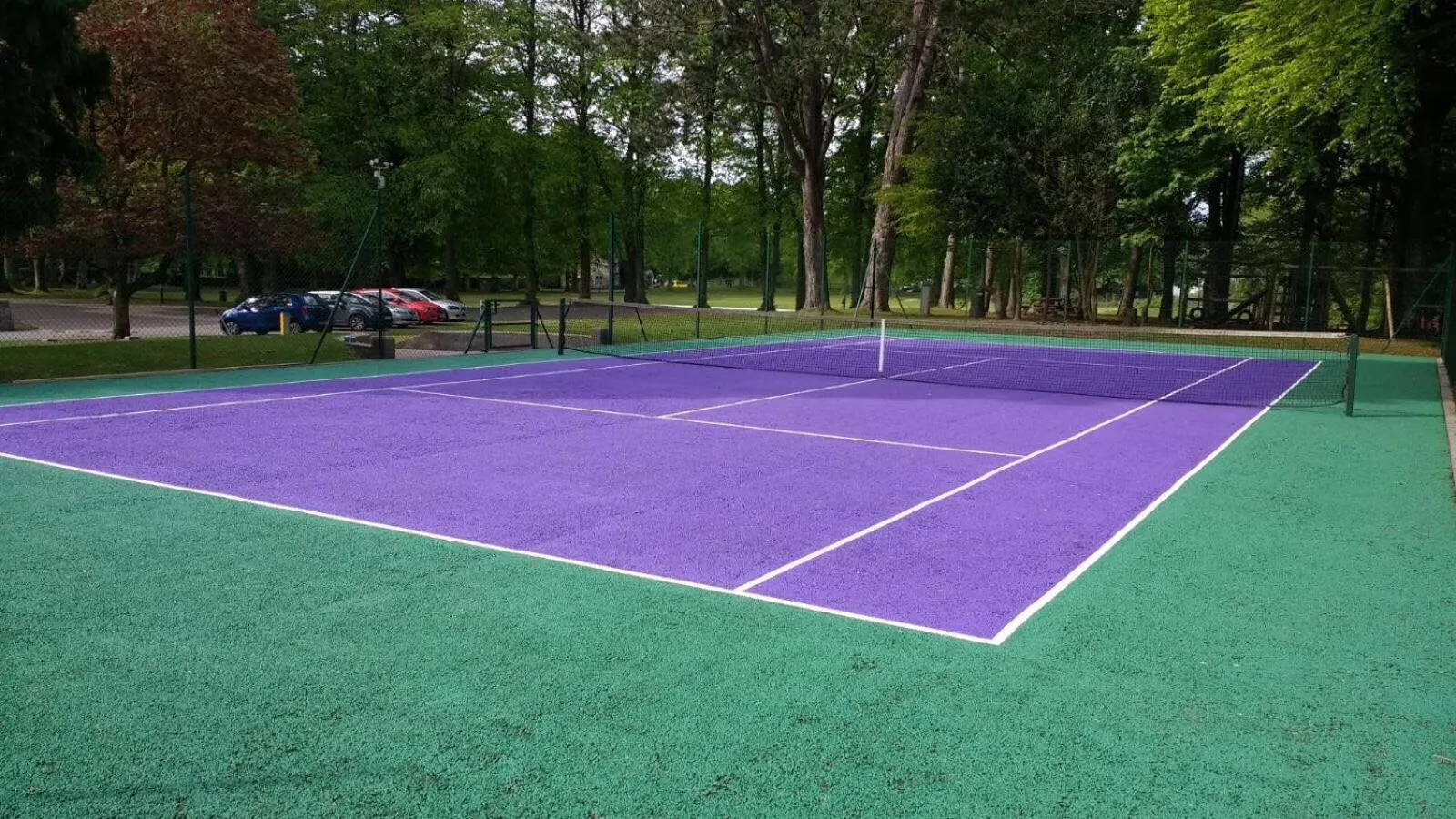 Tennis court in The Highland Club