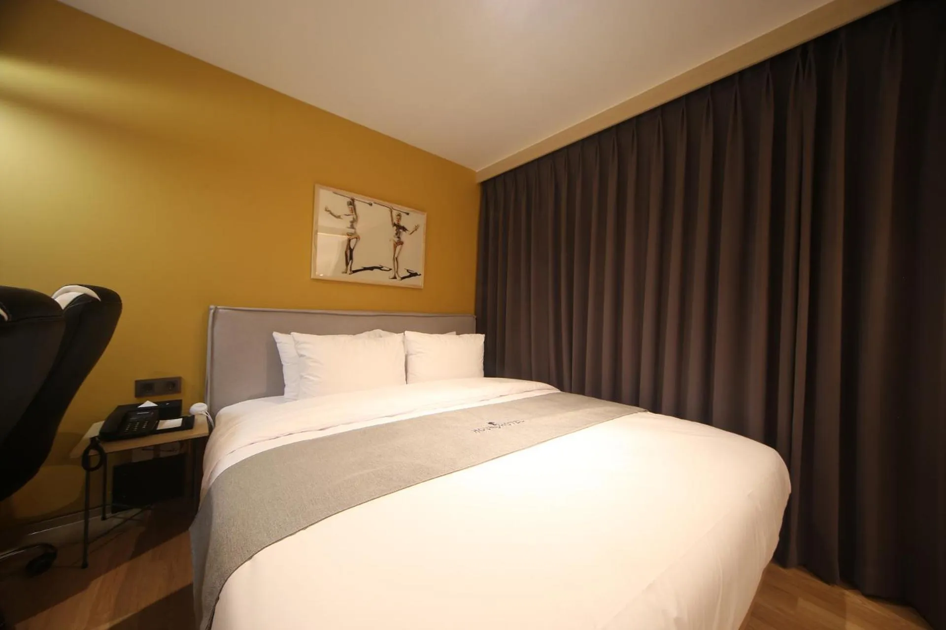 Bed in Dongnae Hound Hotel Sajik Minam Station