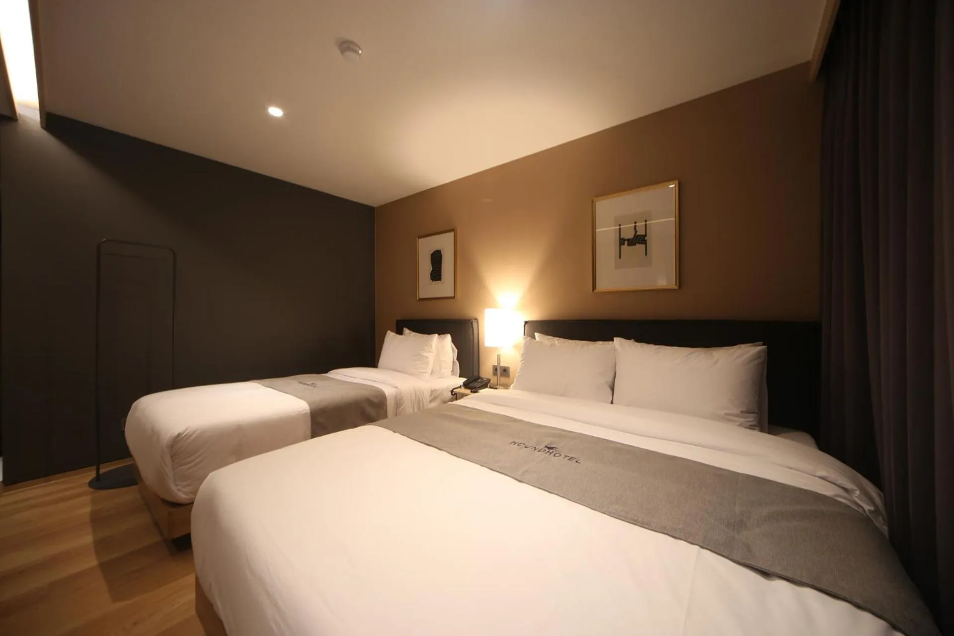 Bed in Dongnae Hound Hotel Sajik Minam Station