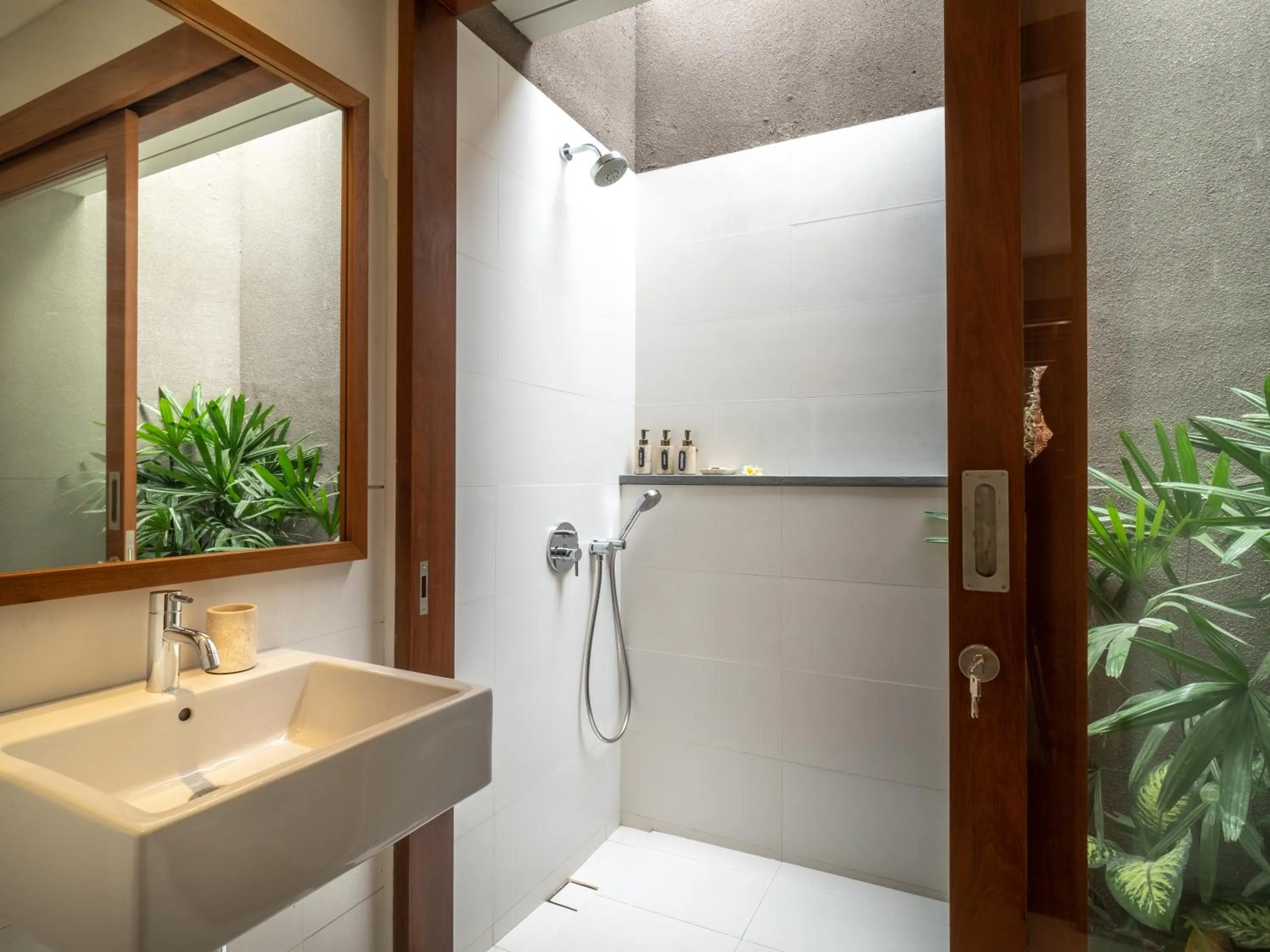 Shower in Bumbak Park Villas By Nakula