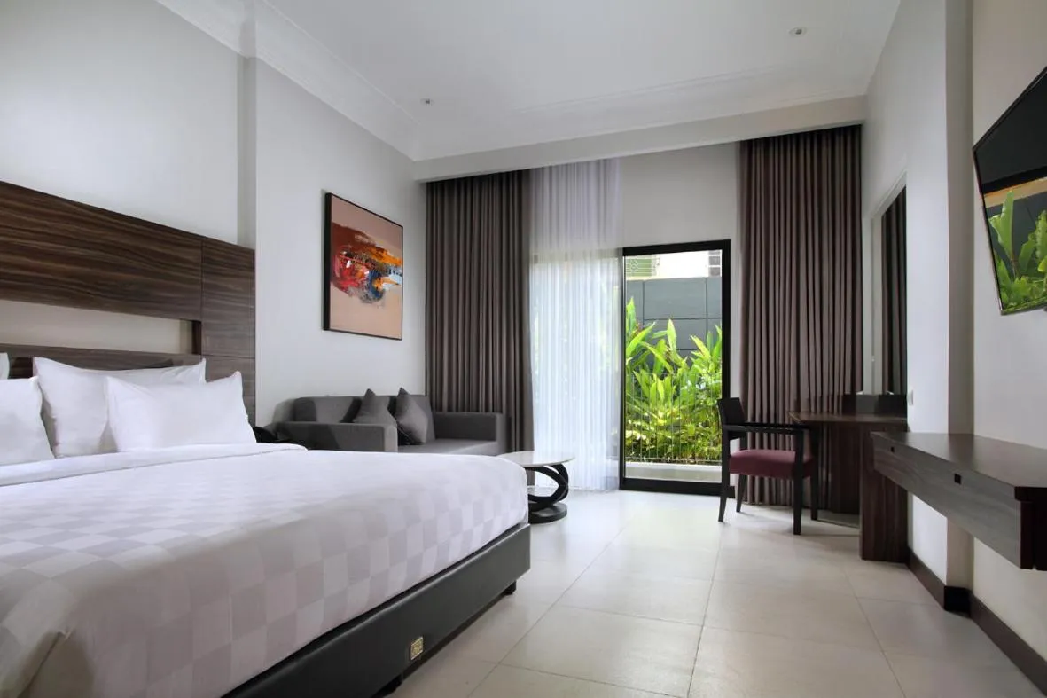 Bedroom in HELIOS HOTEL & CONVENTION