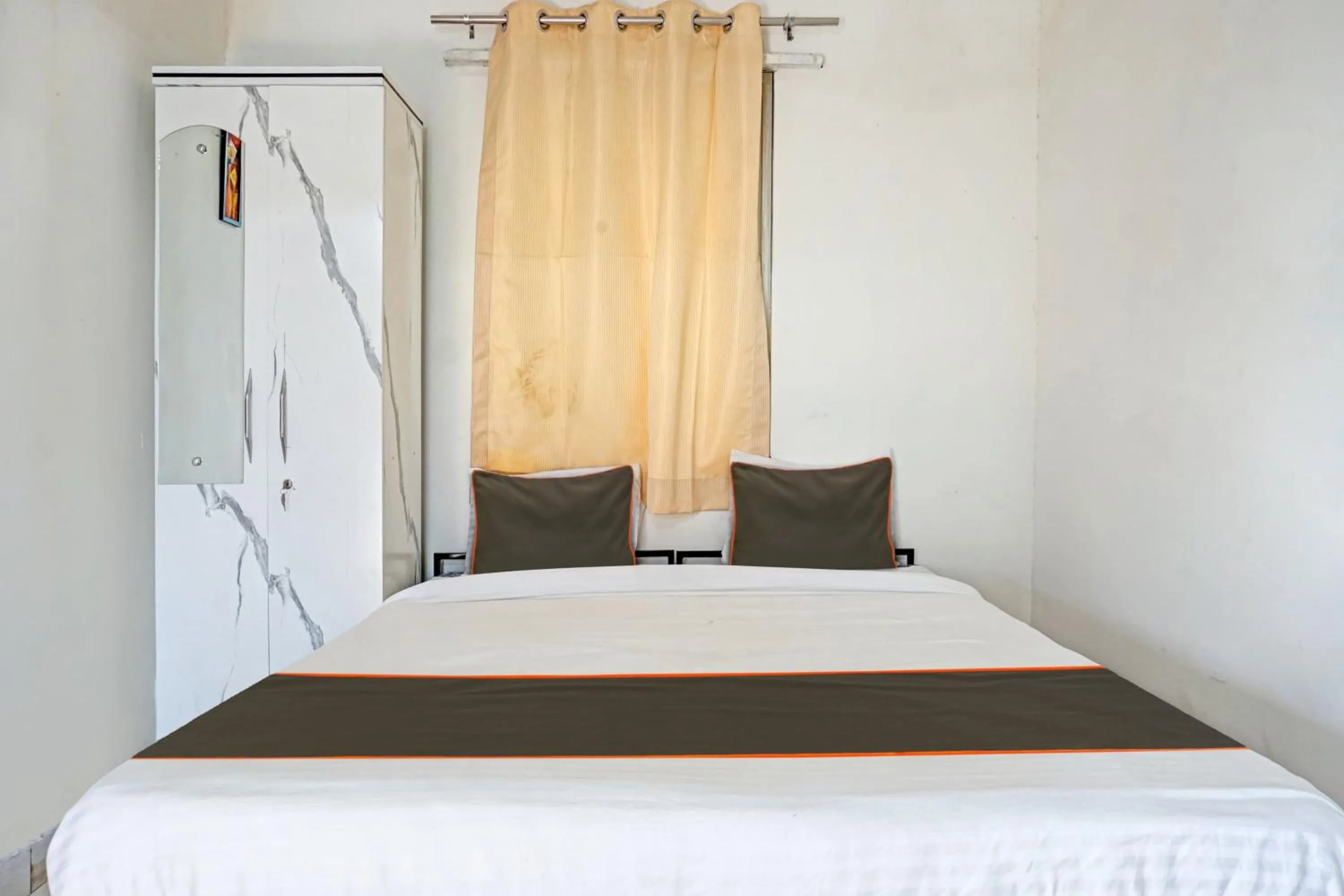 Bedroom in Hotel O Delight Stay Inn
