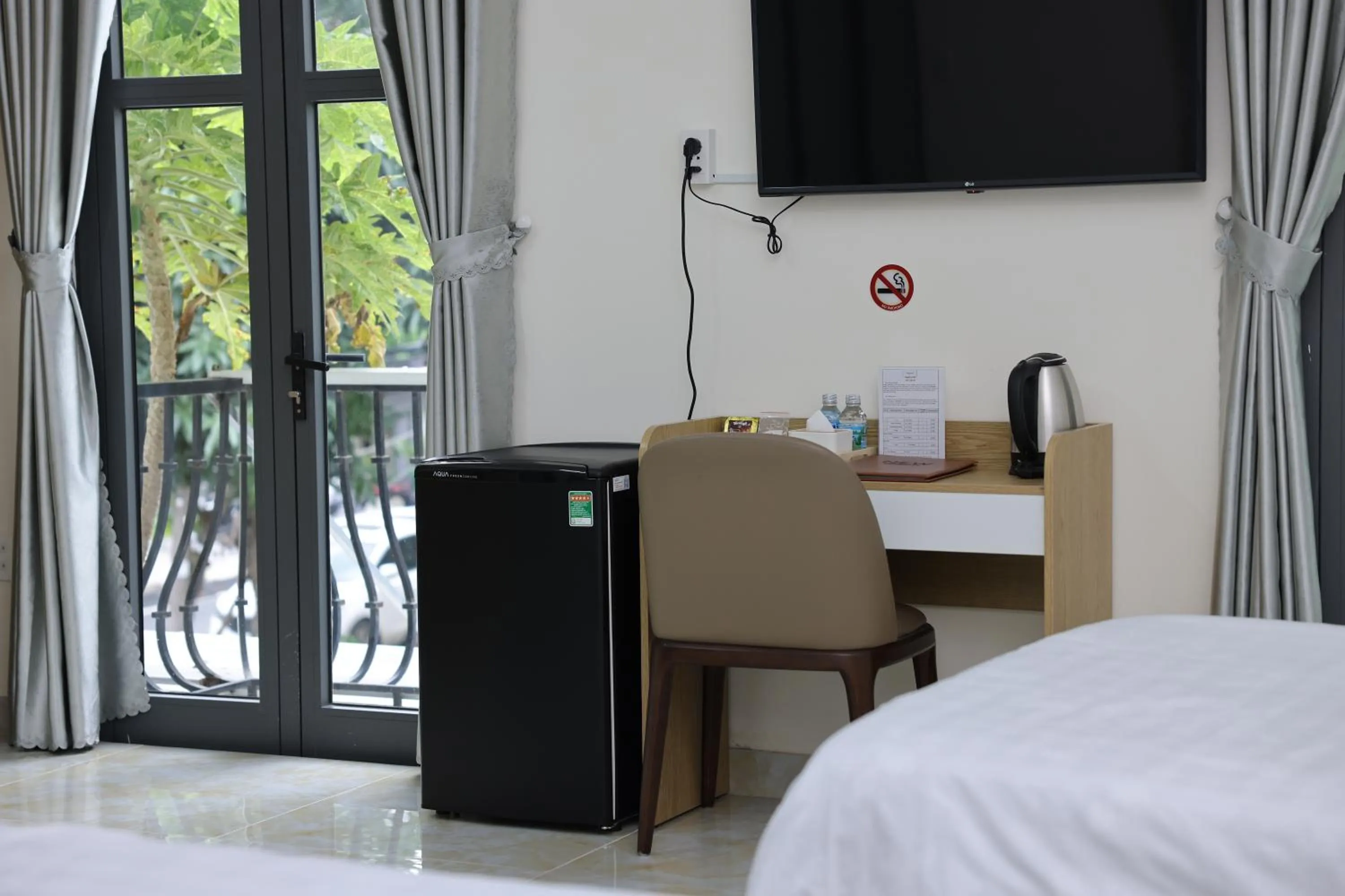 TV and multimedia, Bed in Arina Luxury Hotel - Vincom Tay Ninh