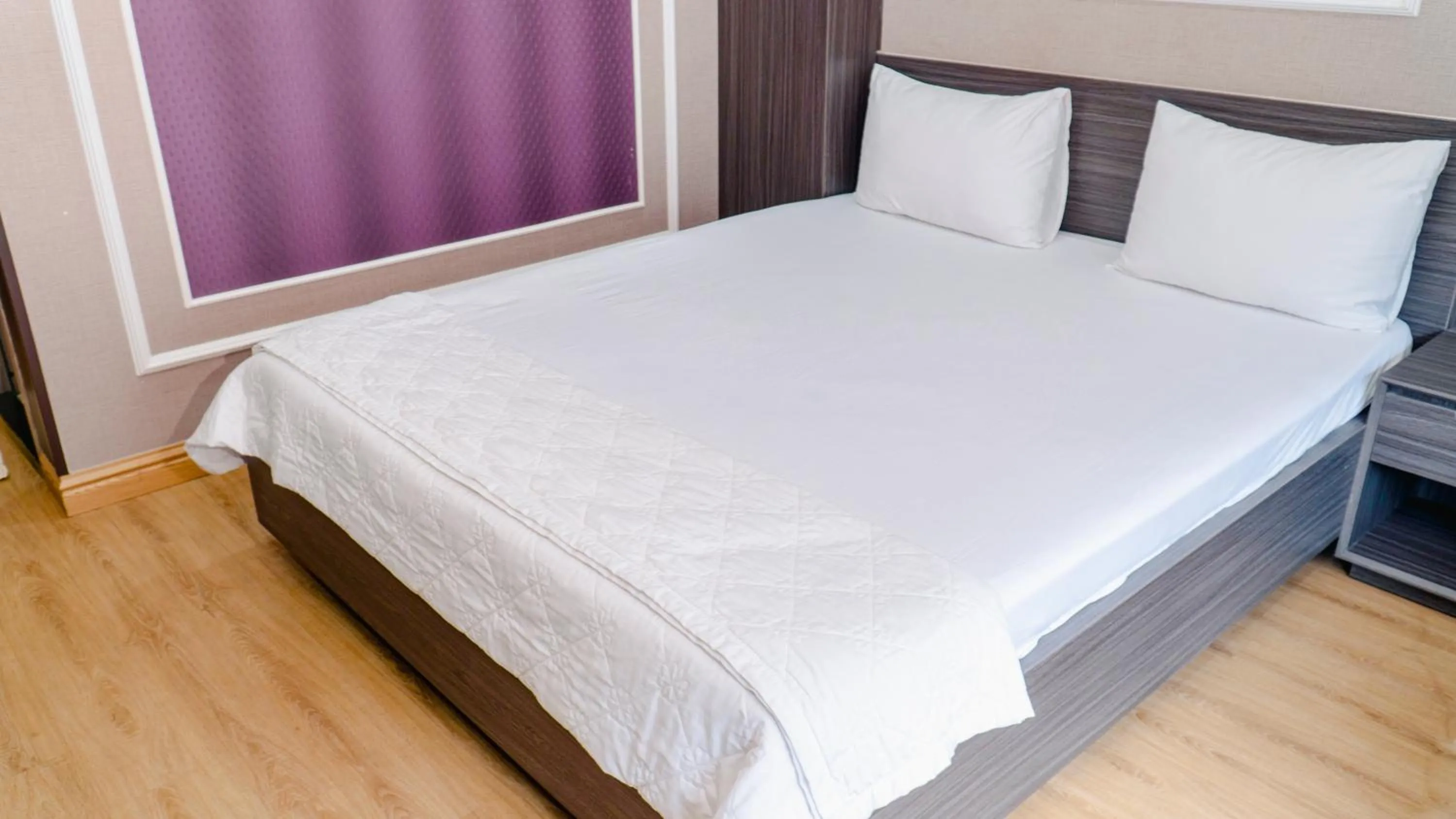 Bed in Thanh Binh Premium Hotel