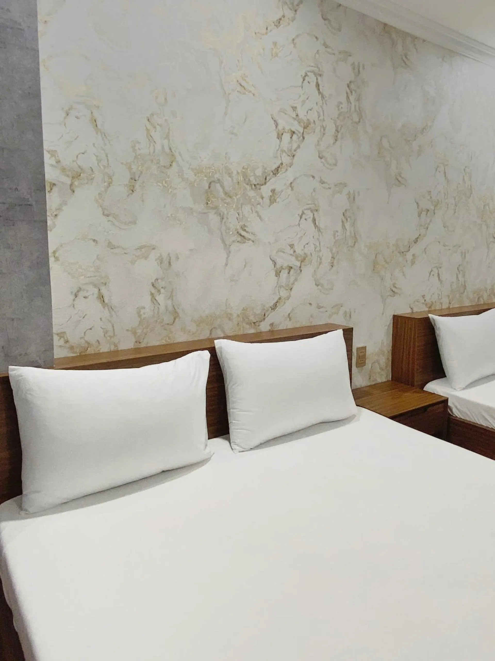 Bed in Thanh Binh Premium Hotel